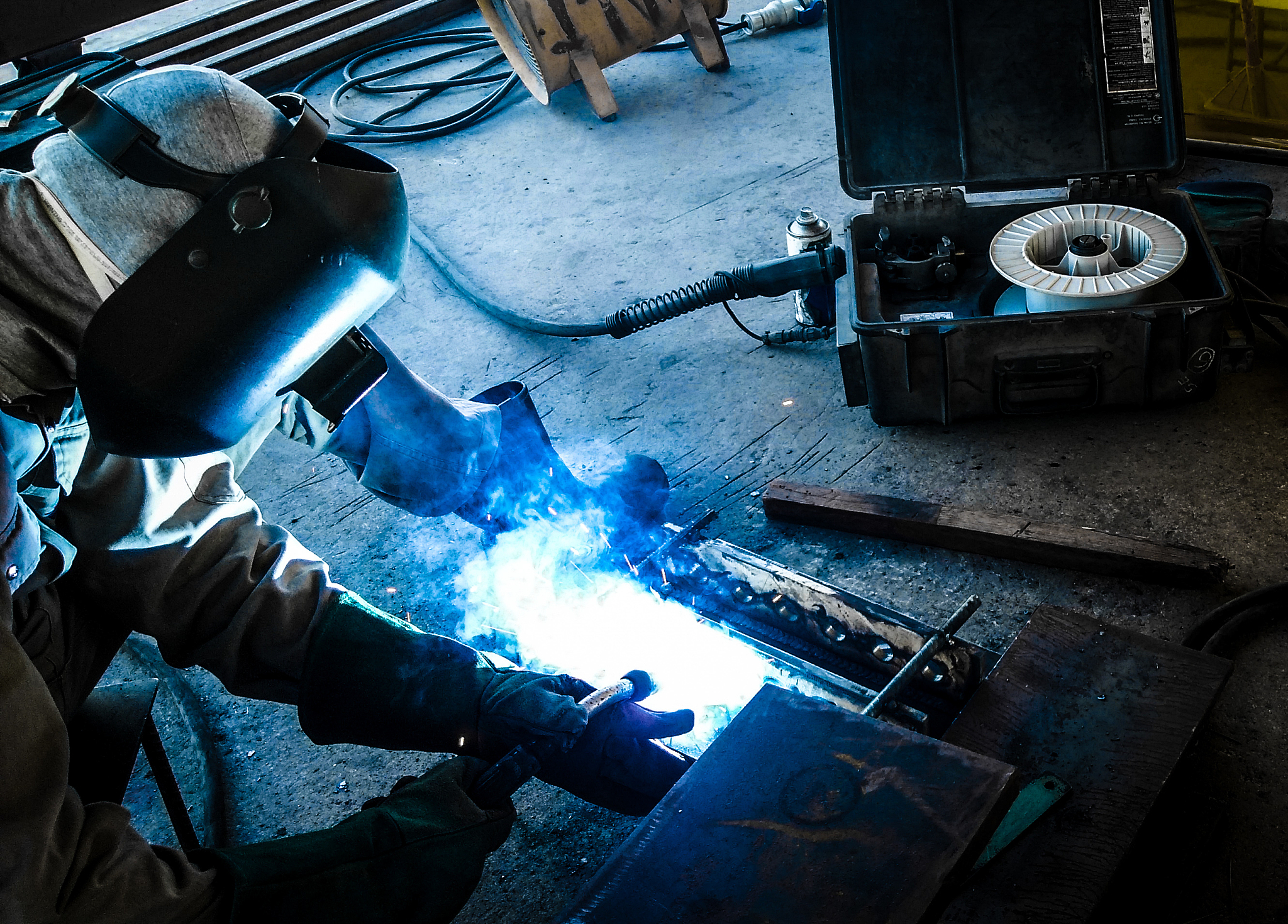 high angle view of worker welding in industry