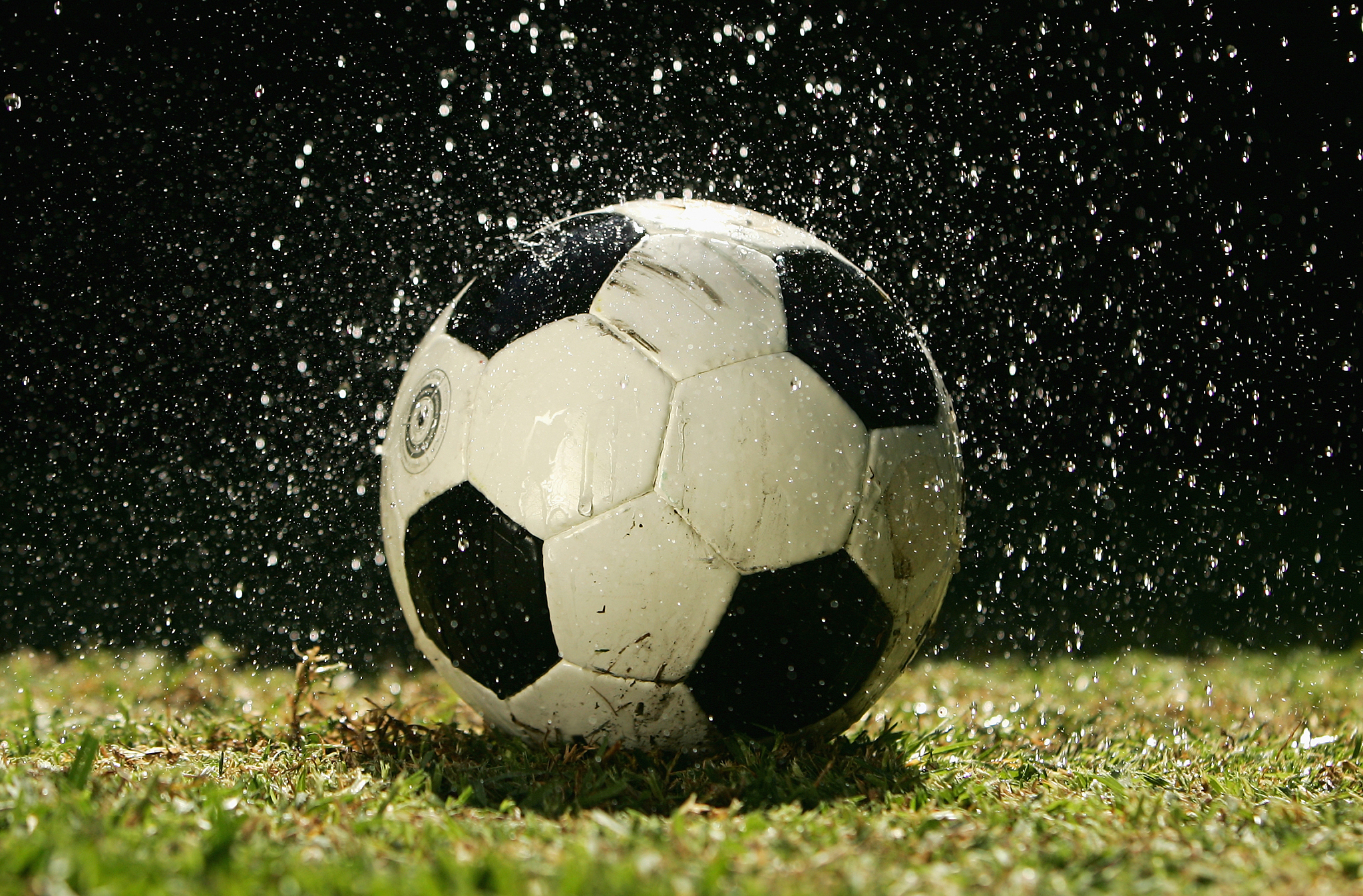 football in the rain