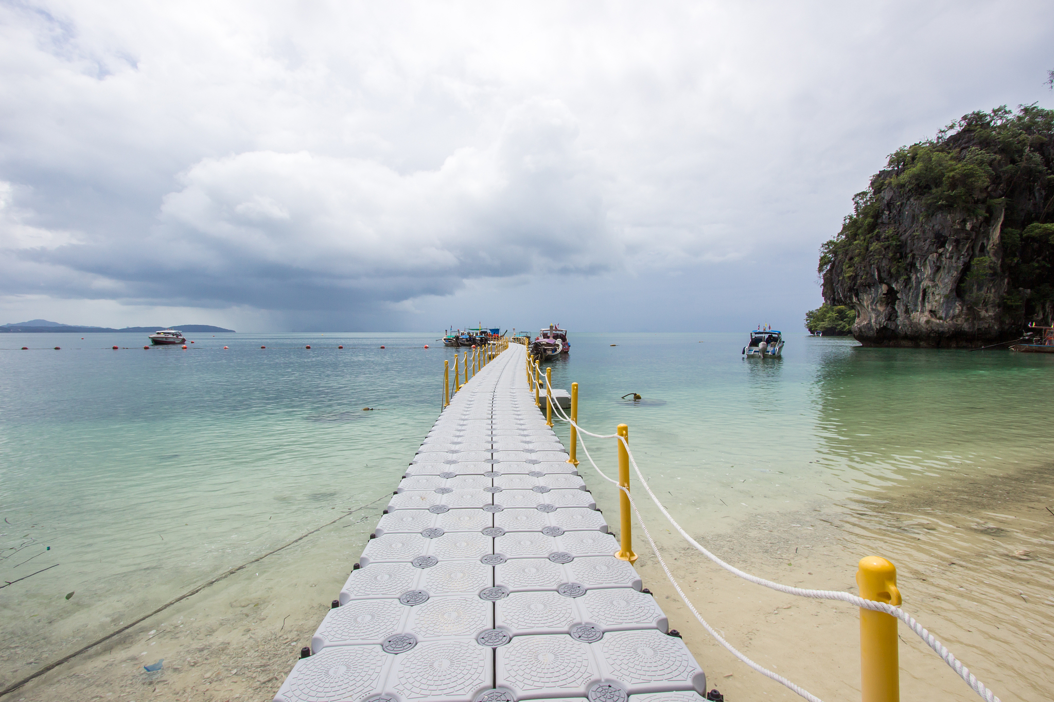 limestone cliffs,white sand and clear water at hong islands