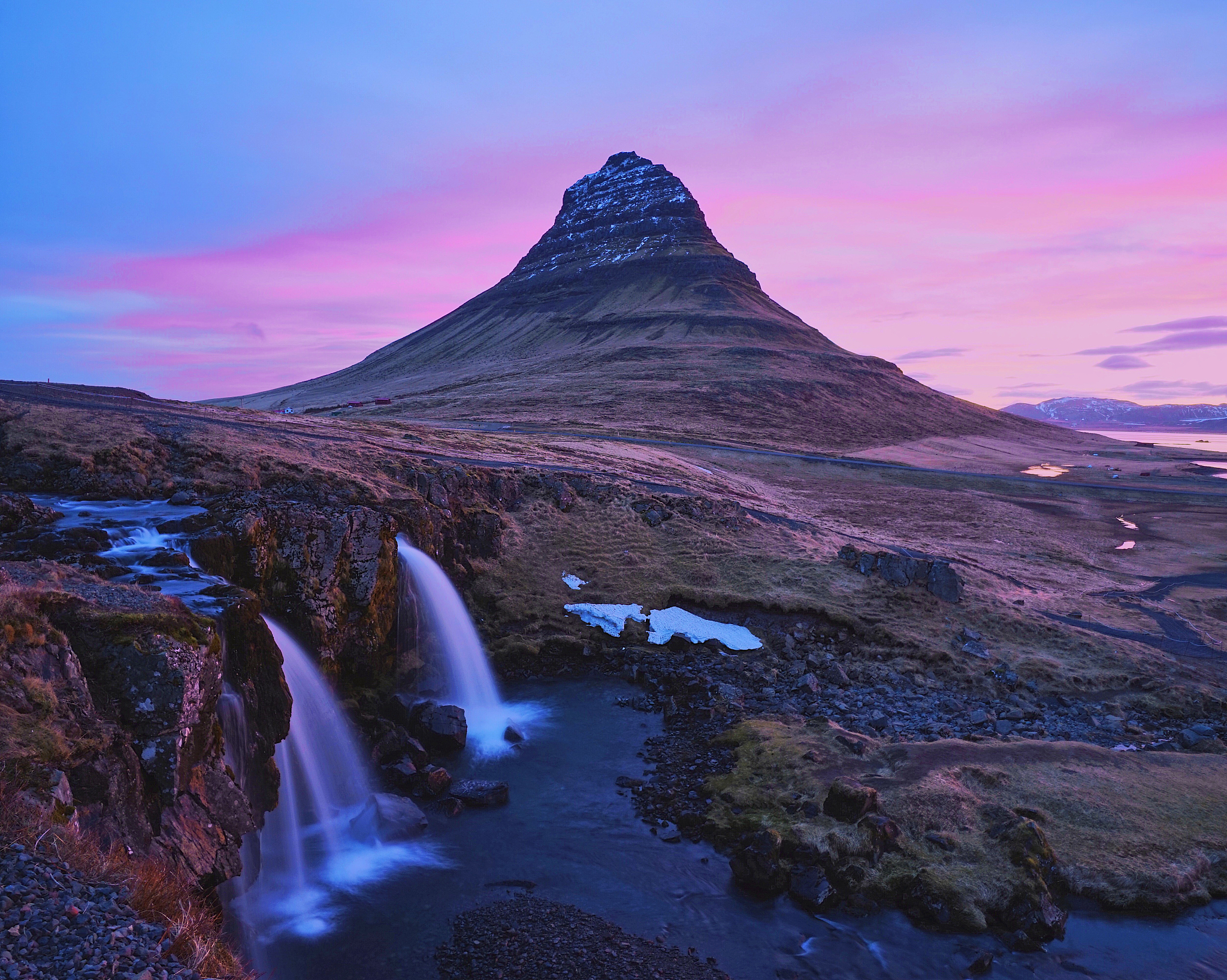 tranquil view of mountain against moody sky