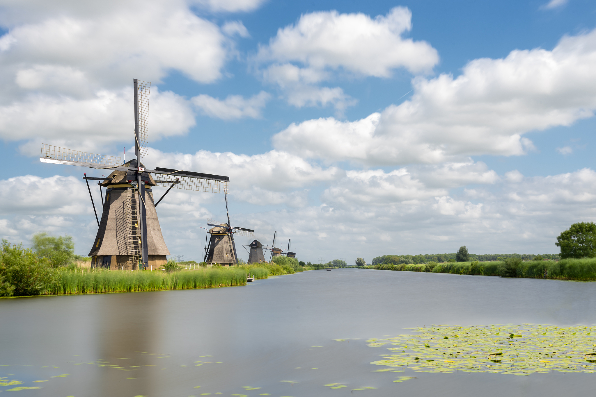 row of windmills in holland
