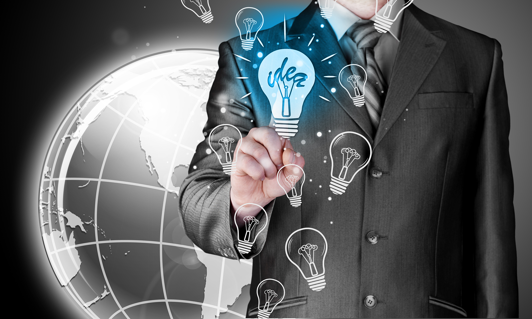 business man touching light of idea