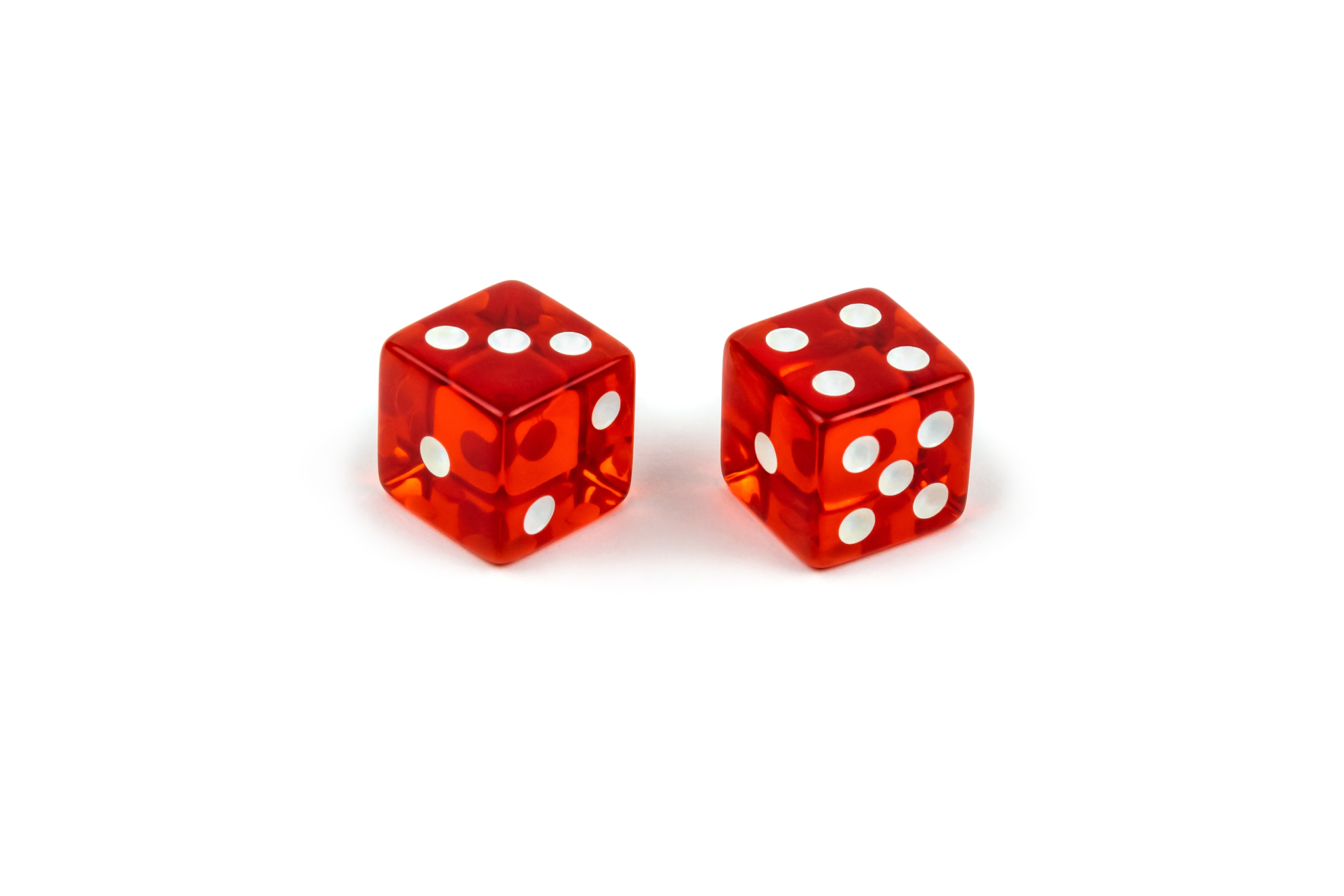 two red glass dice isolated on white background. three and four.
