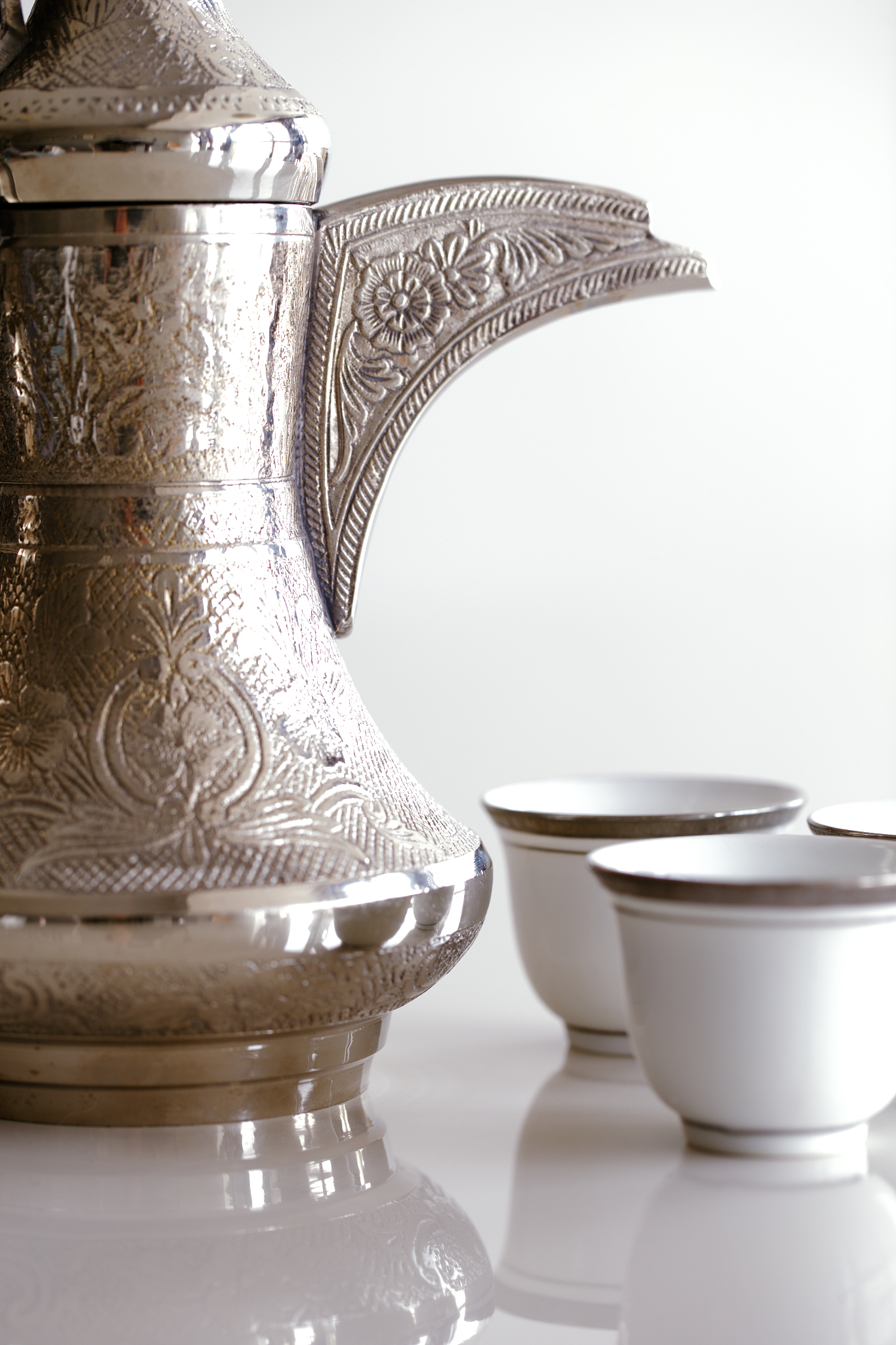 dallah is a metal pot designed for making arabic coffee