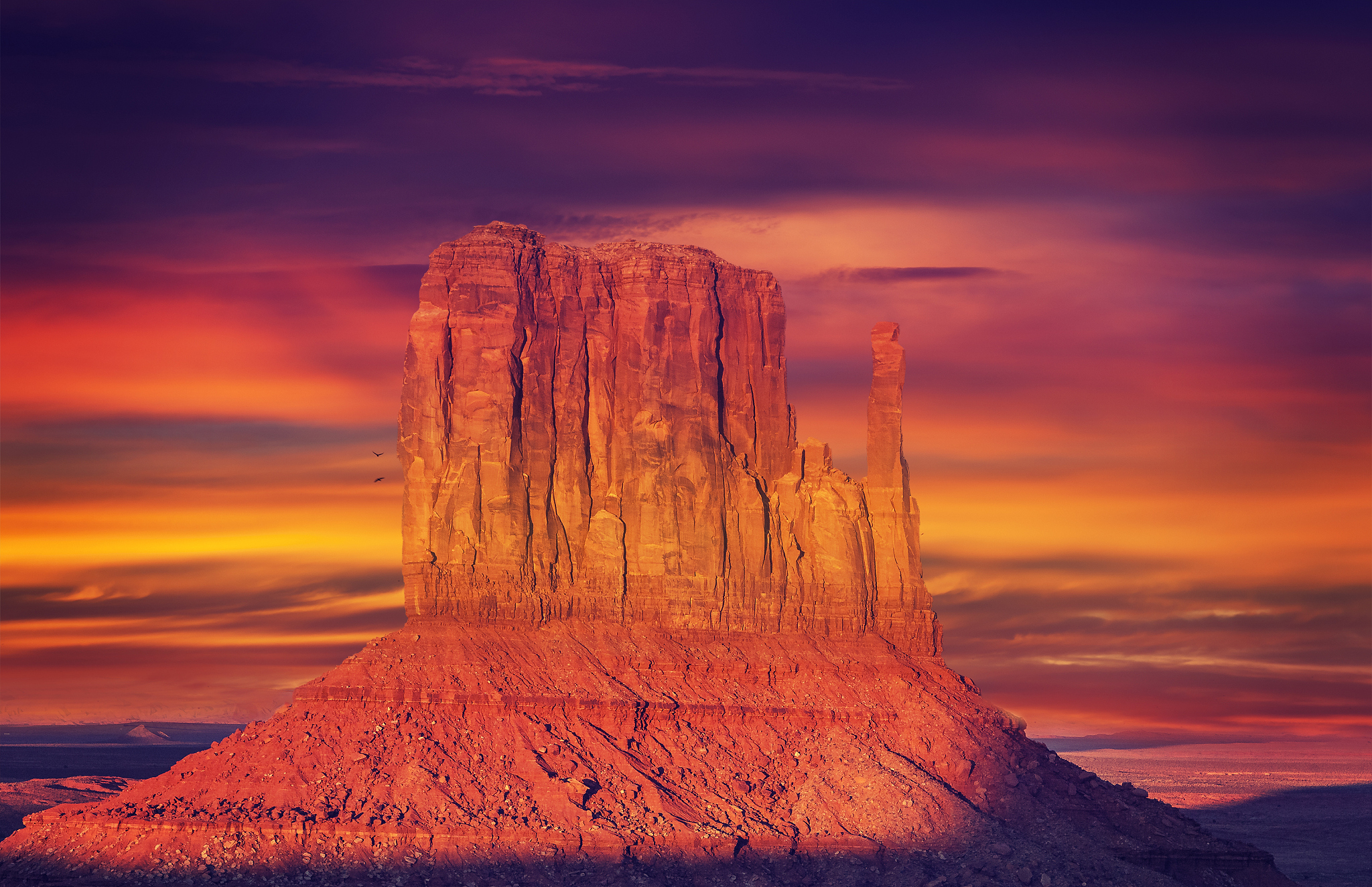 vintage toned photo of monument valley at sunset, usa.
