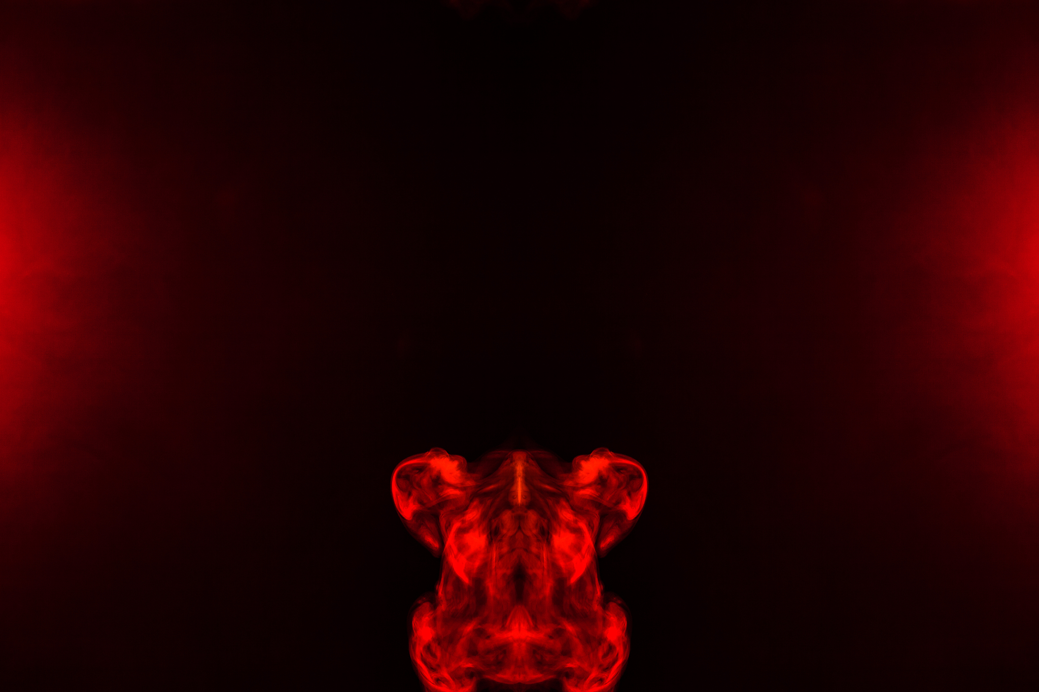 a red smoky pattern in the shape of an animal or car moves up be