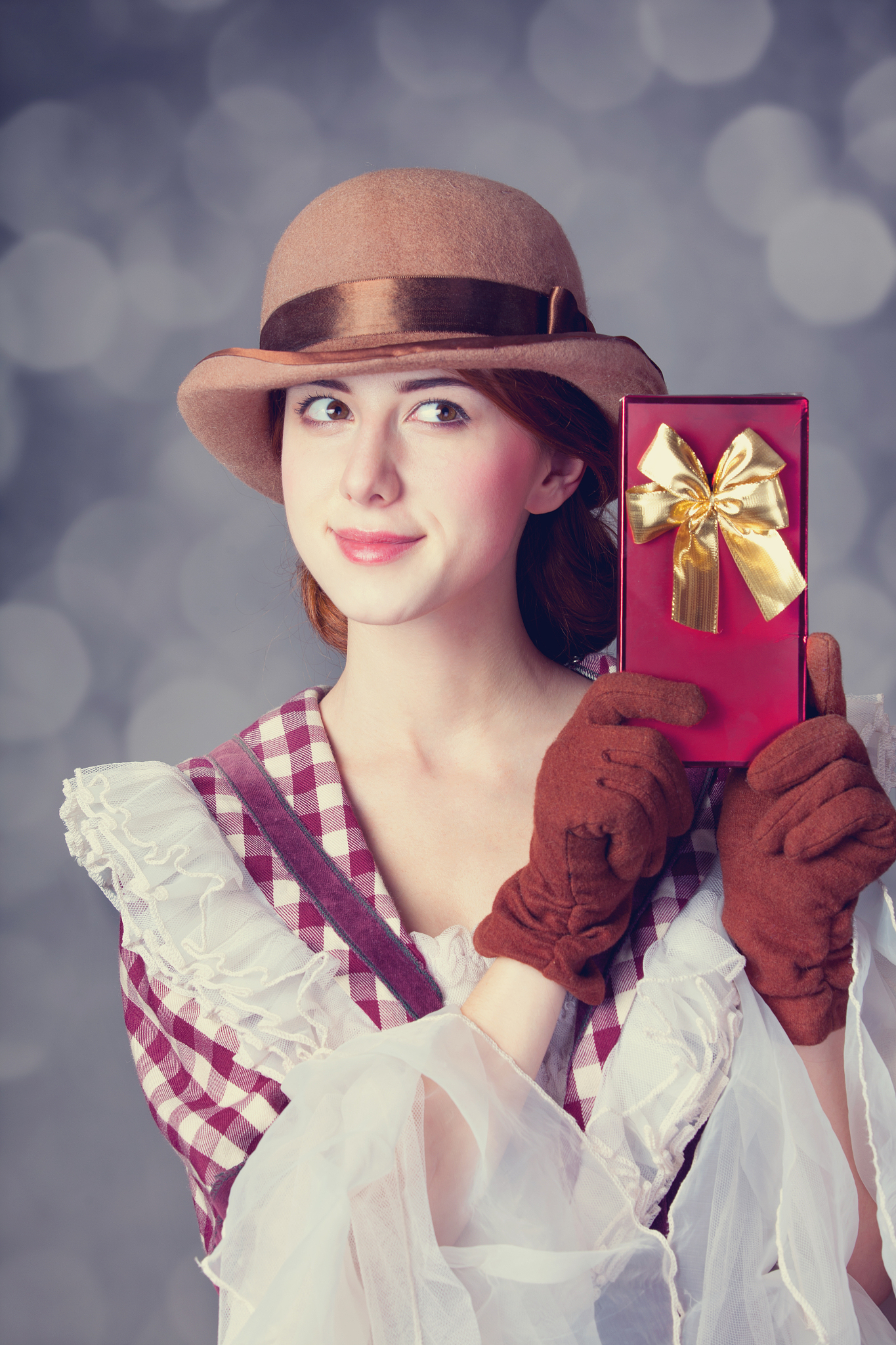 beautiful redhead women with gift.