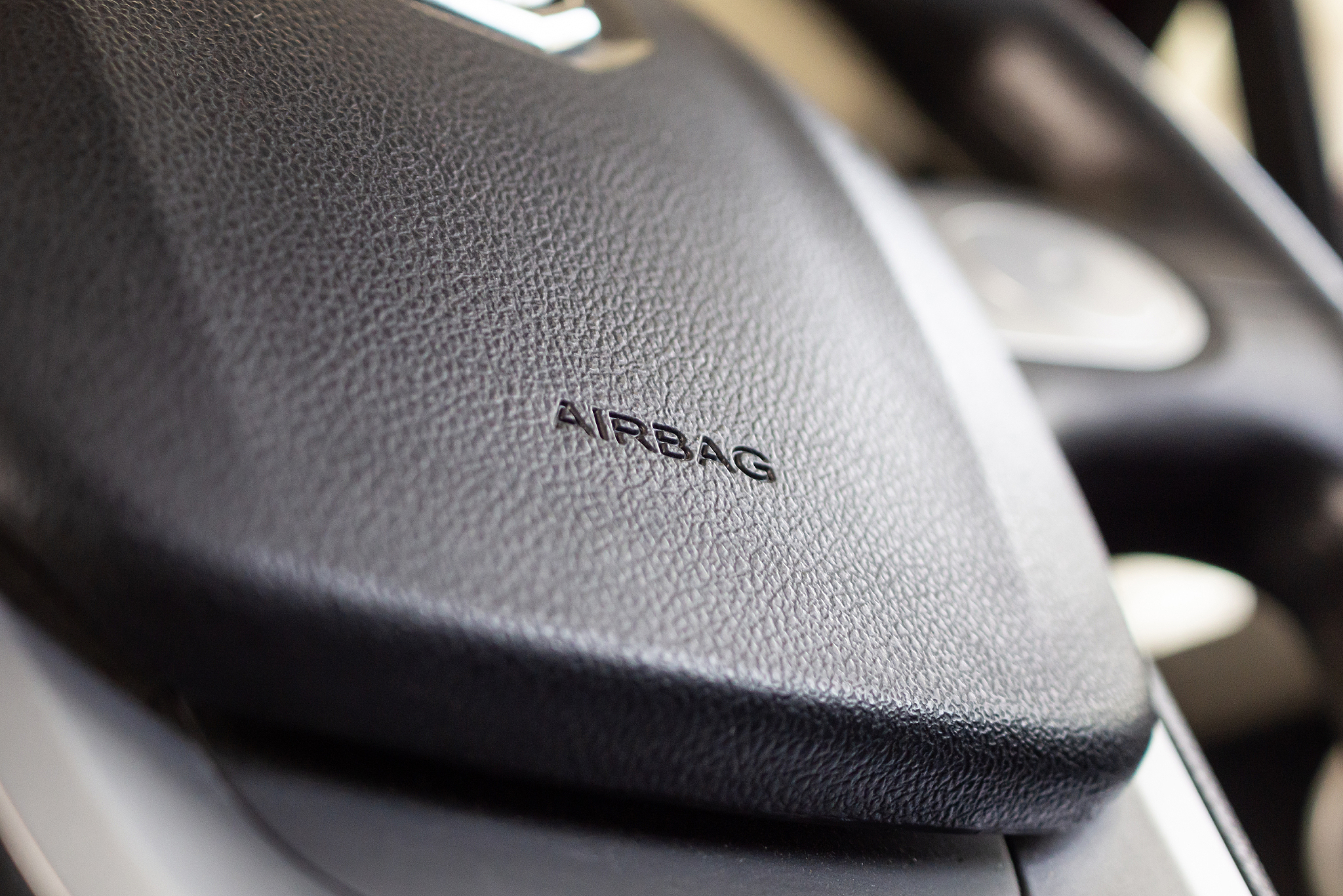 safety airbag sign on car steering wheel