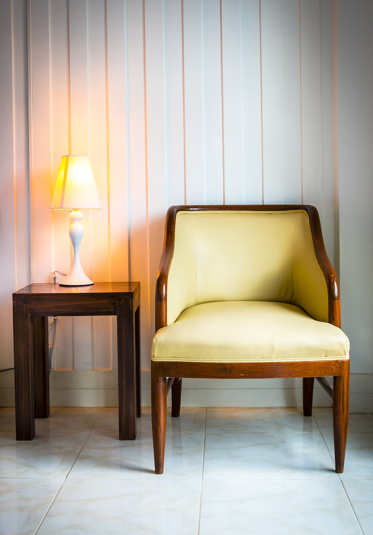 armchair with desk lamp