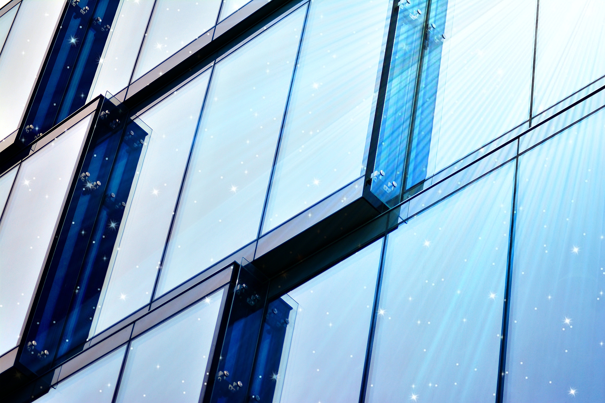 sky with the stars above a office building.