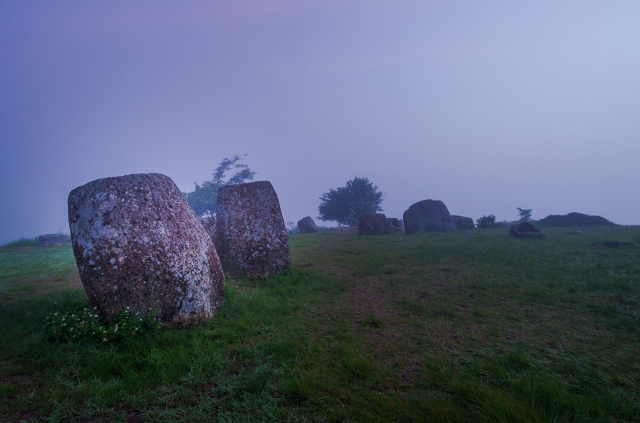 a field of jars in phonsavann, laos