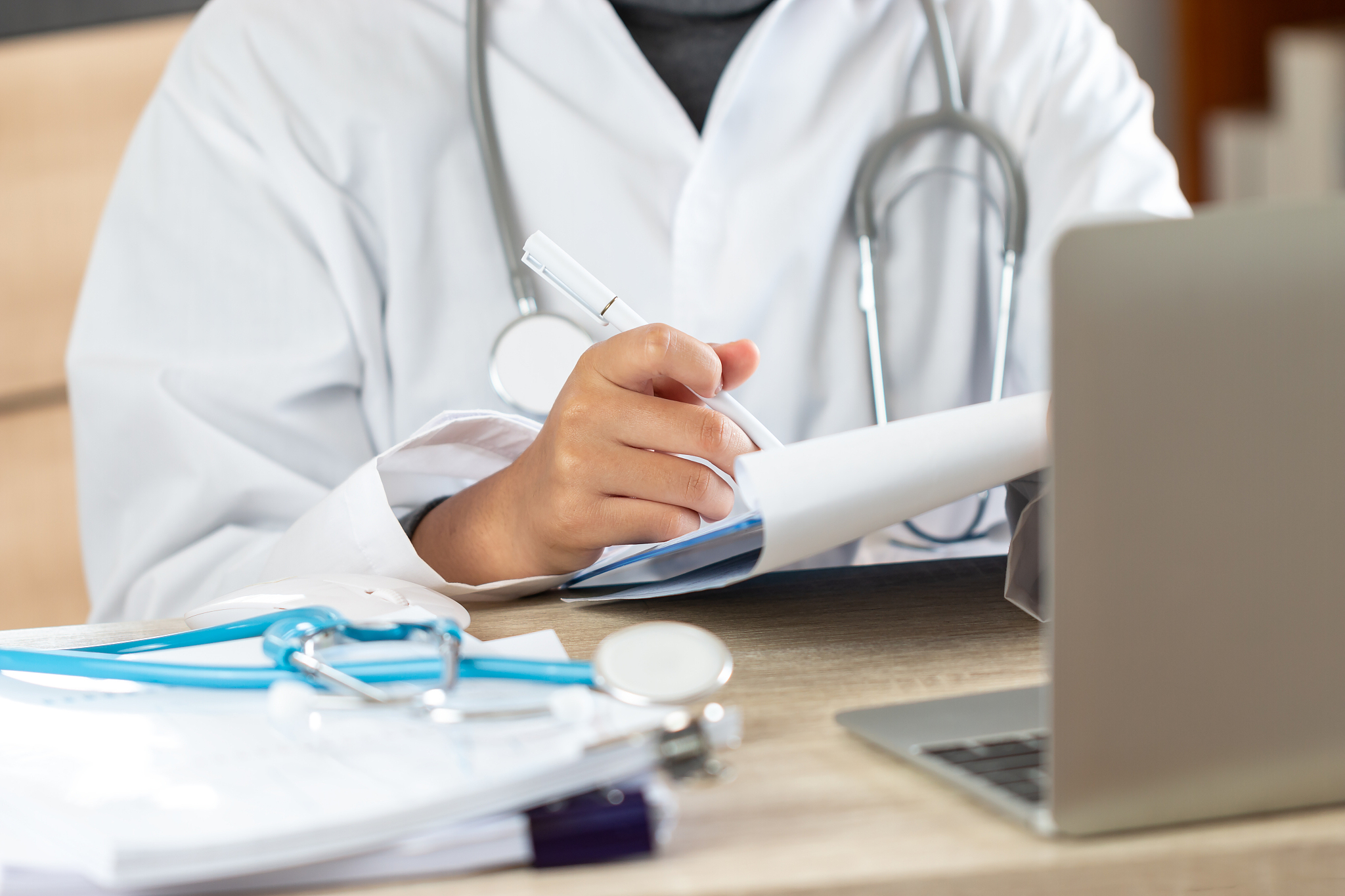 healthcare and medical concept, doctor or female physician writi