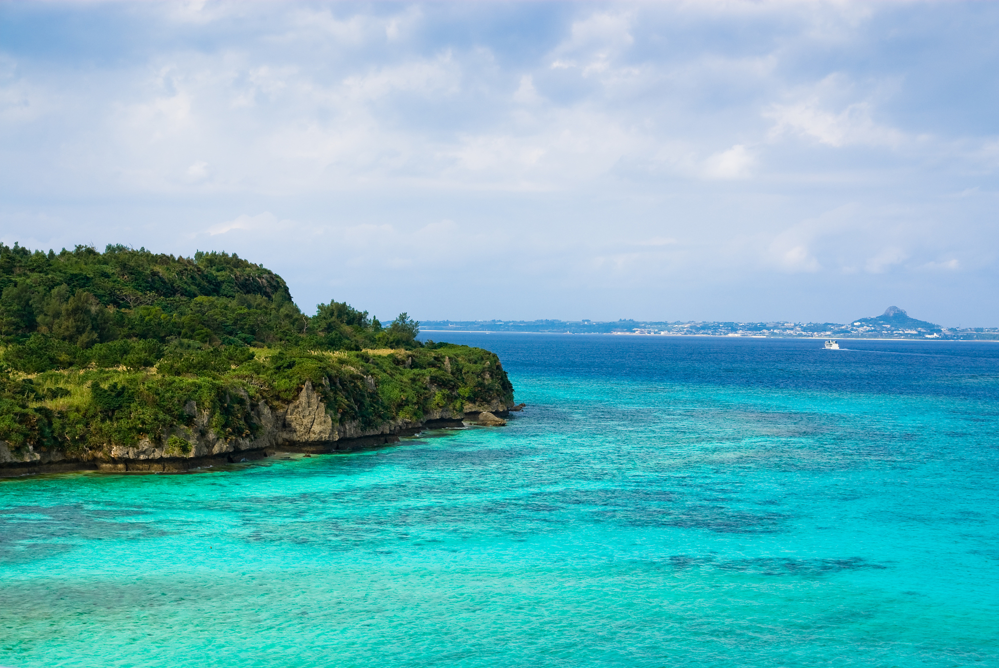 blue clear water around the coral island, okinawa