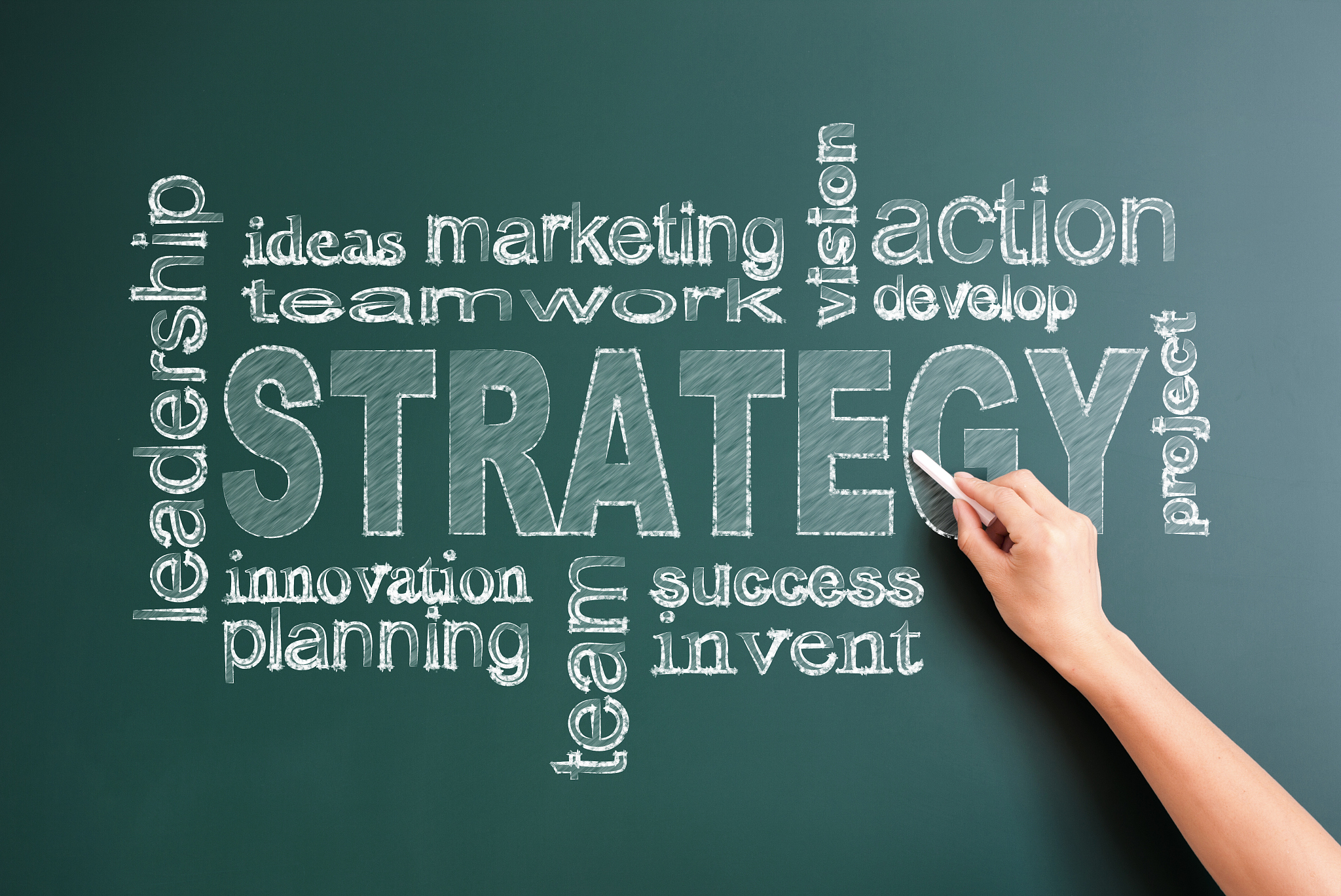 strategy related words written on blackboard