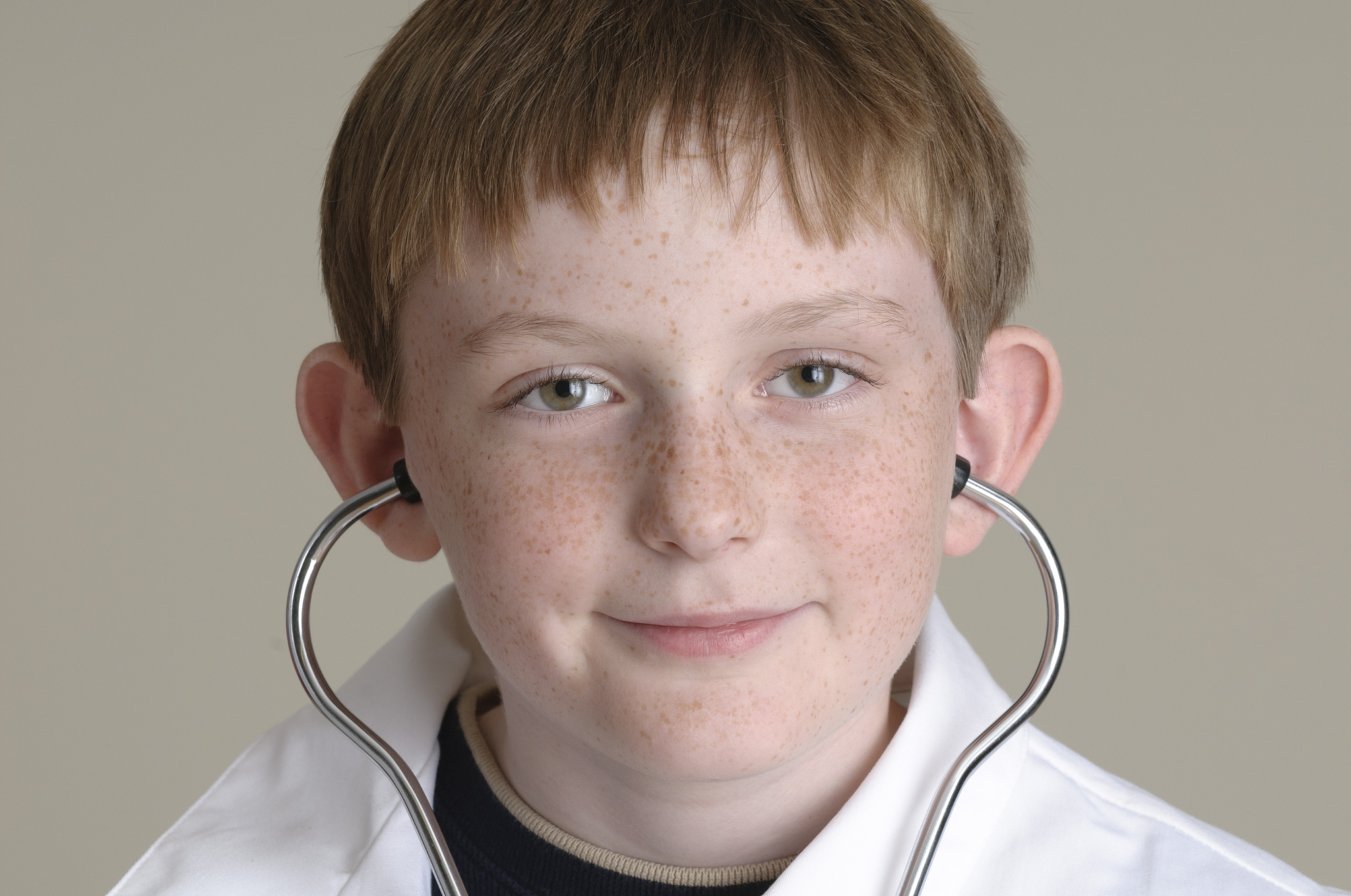 red head boy playing doctor