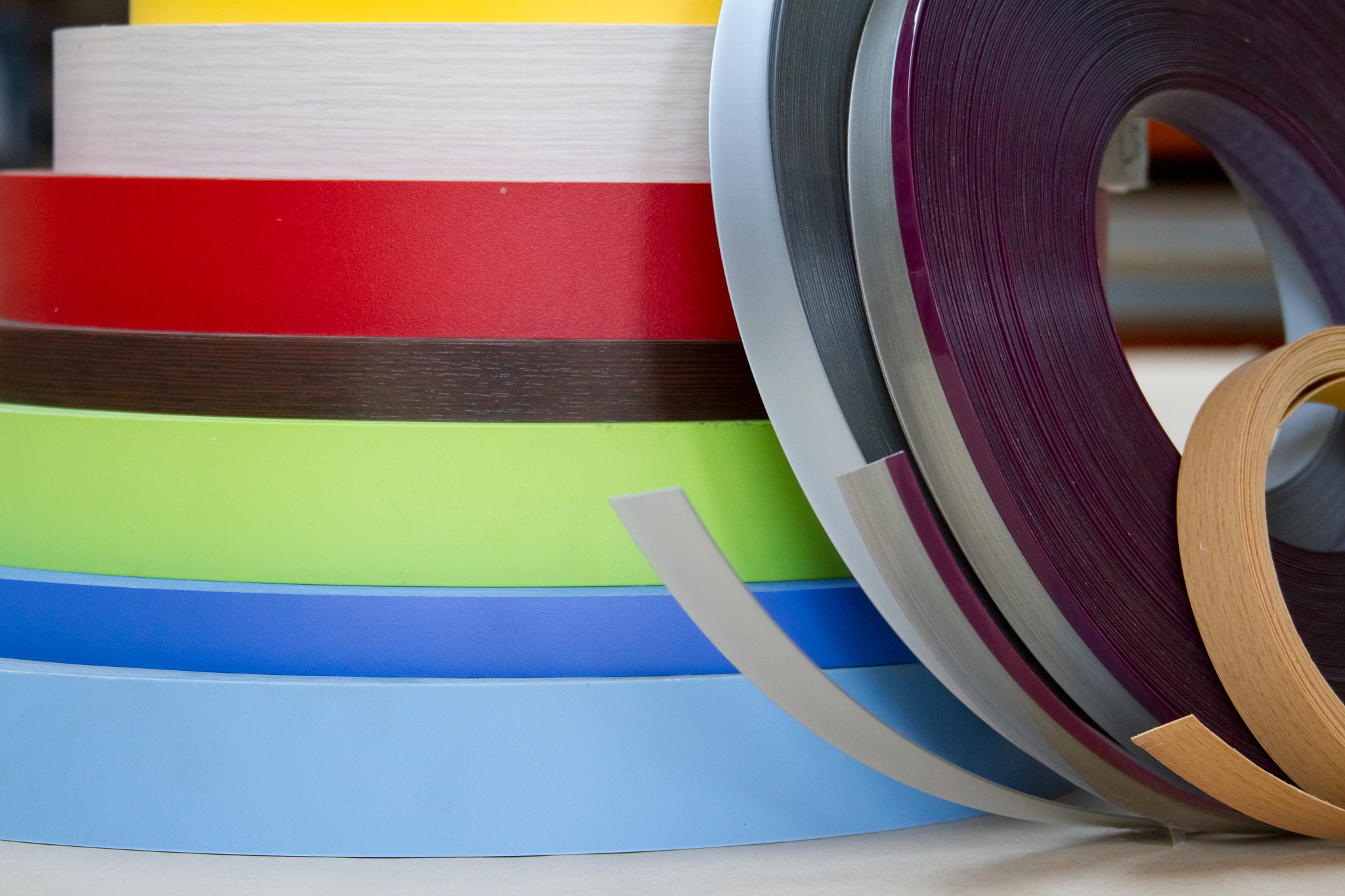 multicolored bobbins of pvc edge and melanin for the manufacture