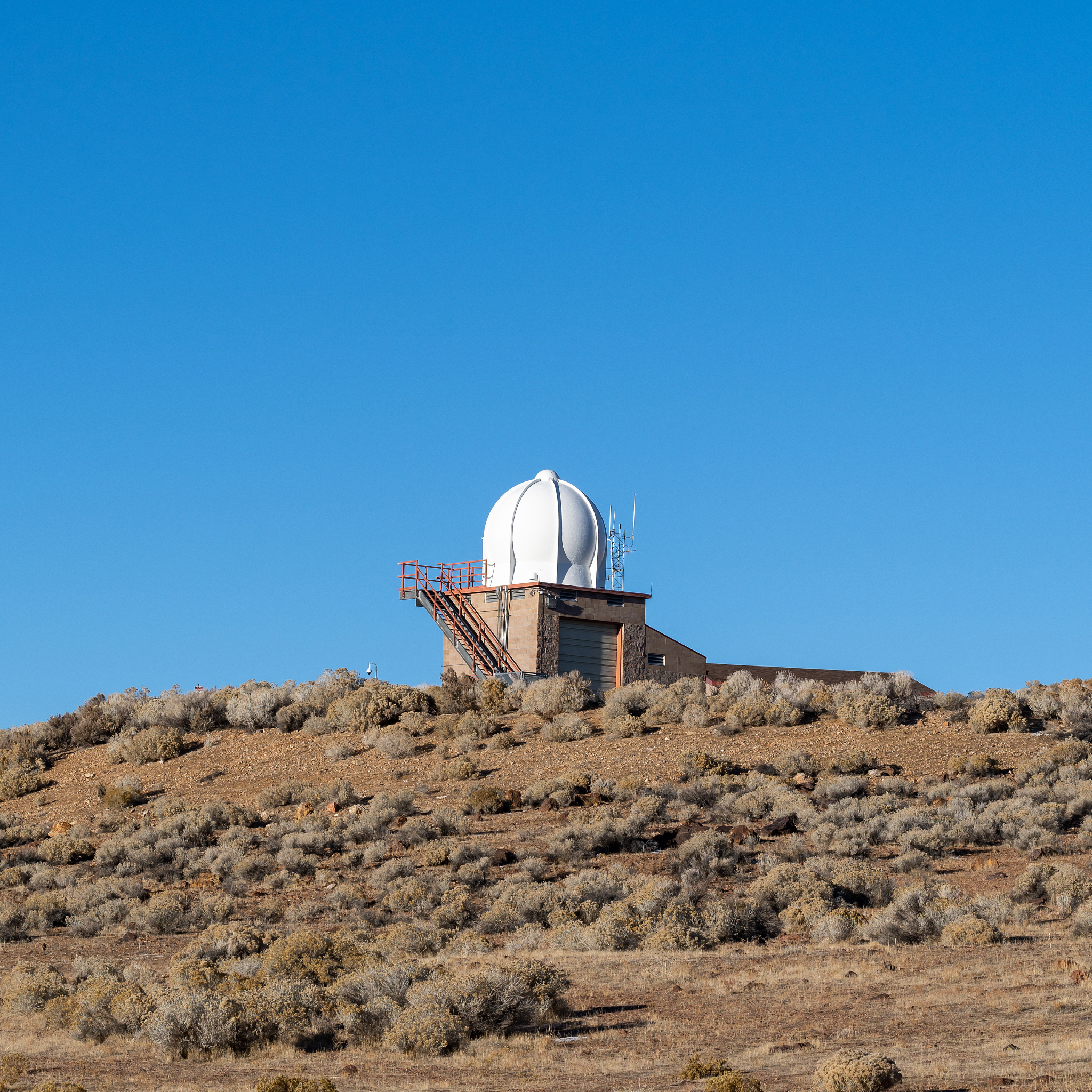 weather observation station on a mountain top.