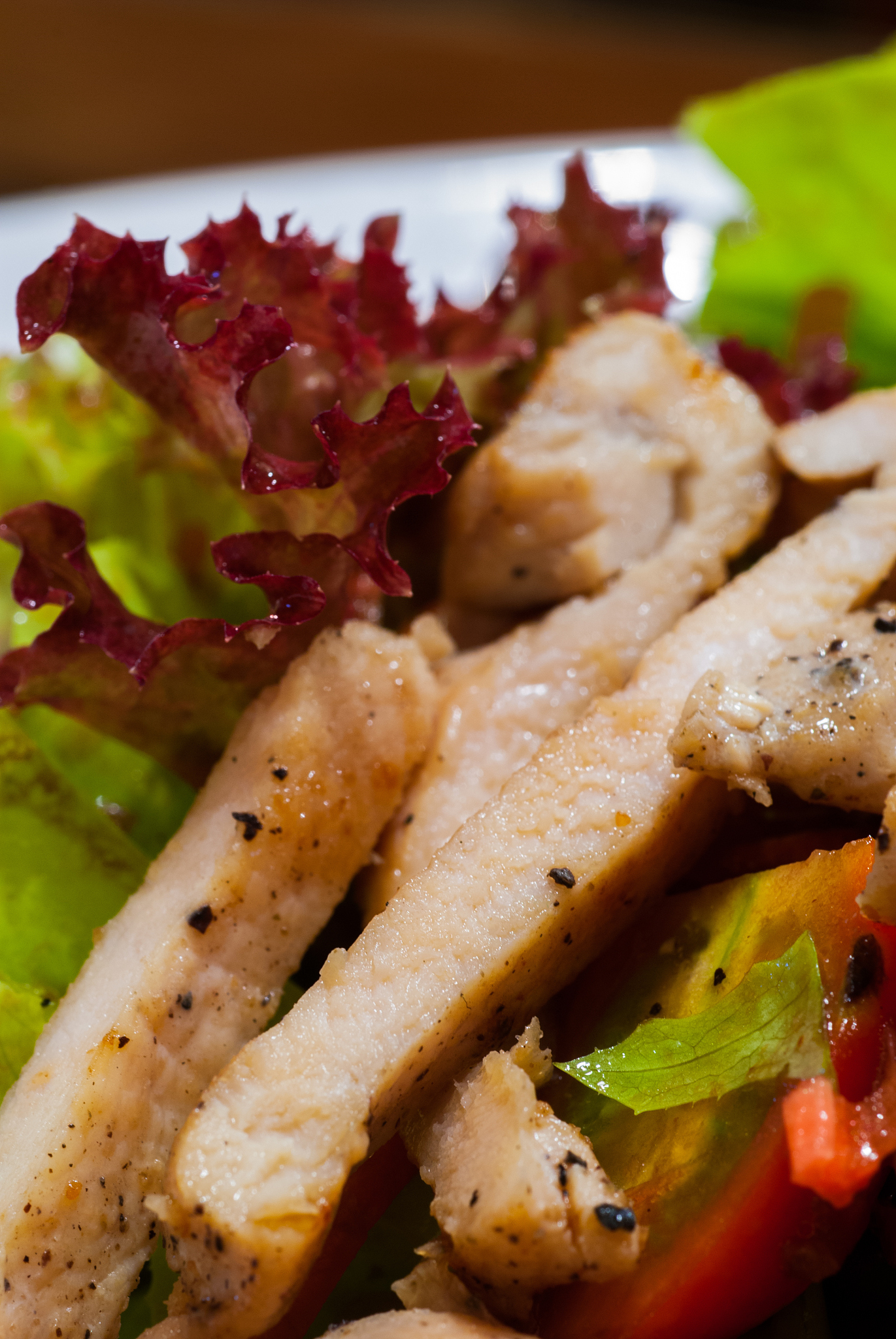 fresh healthy salad with grilled chicken