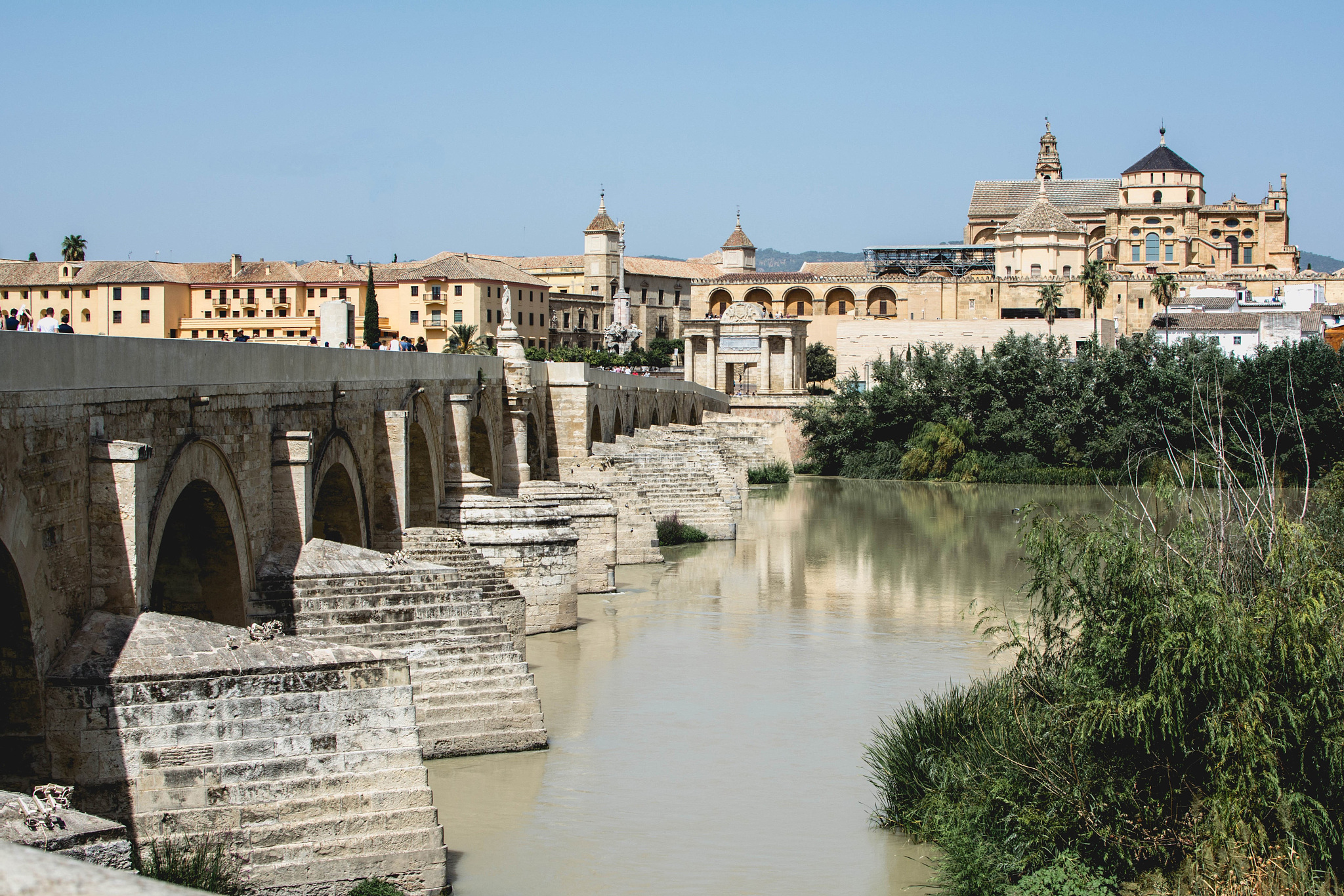 the view of great mosque - cathedral and the roman bridge of có