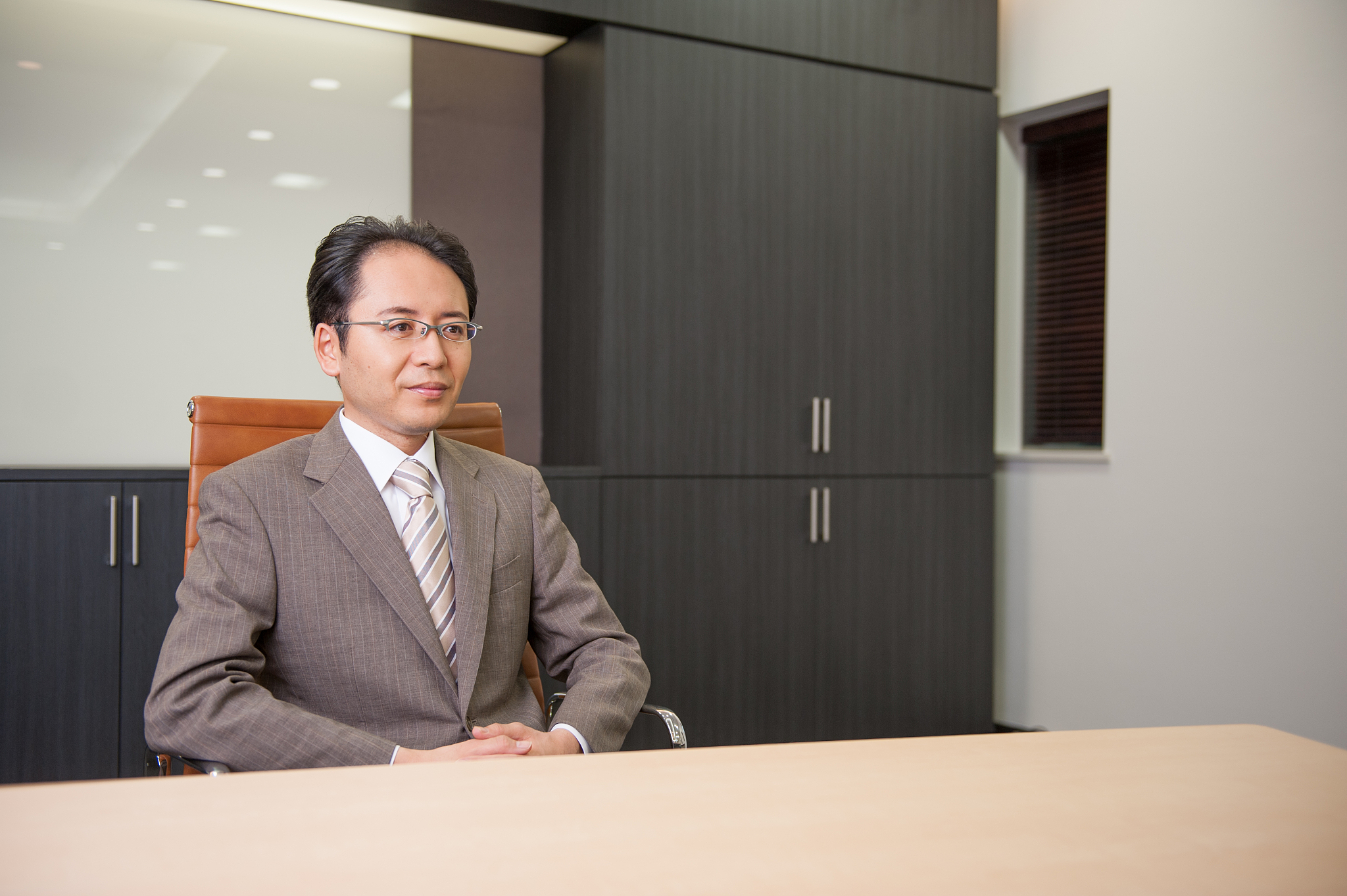 relaxed businessman asking for attention