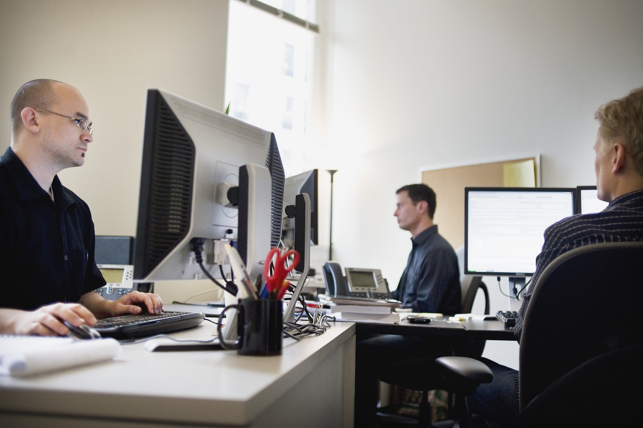 businessmen working on computers