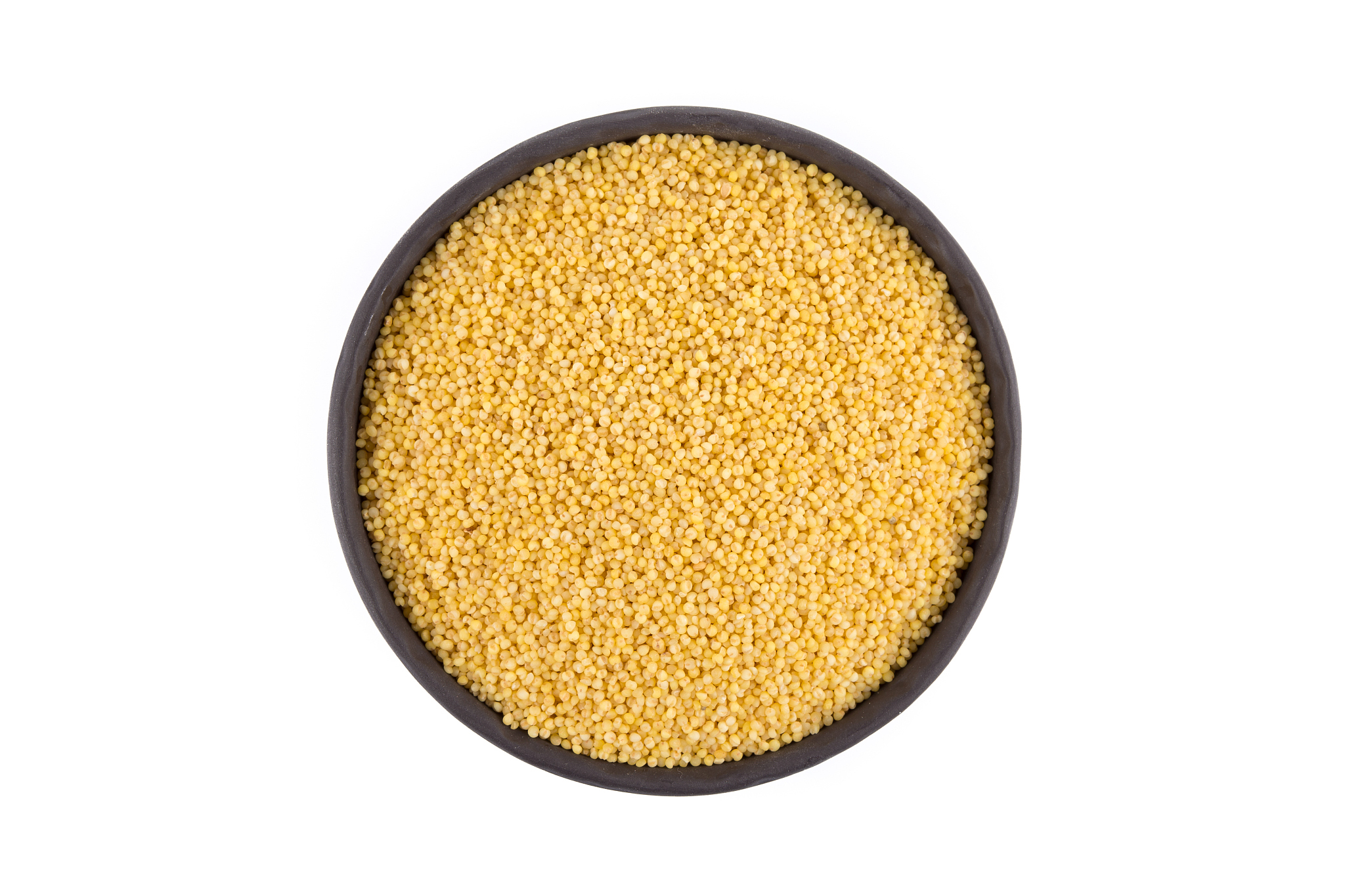 dry millet isolated on white. top view or flat lay. healthy food