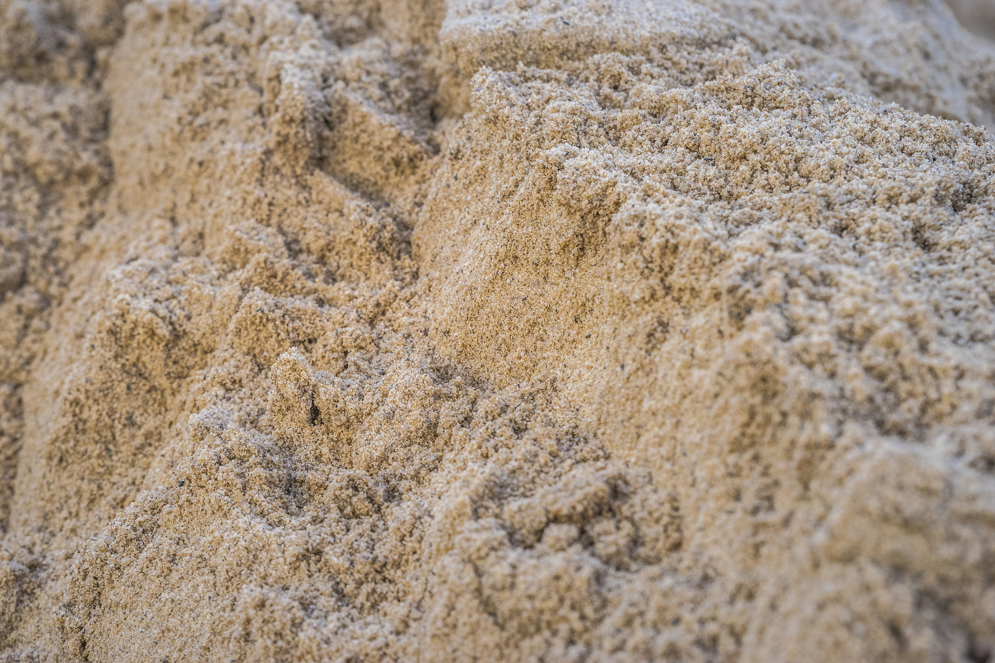 brown heap of sand material for constructing or the kindergarten
