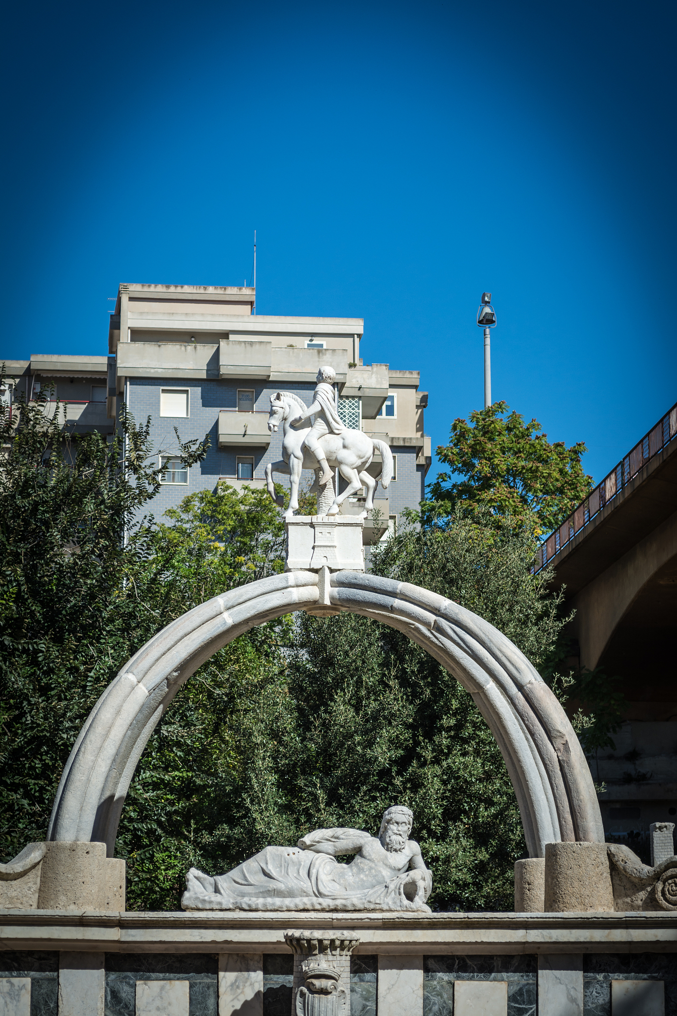 detail of ancient fountain in the middle of the city