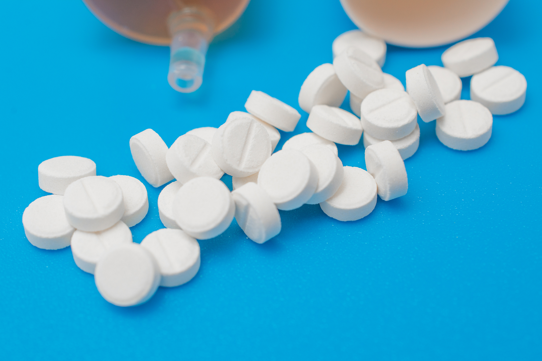 pills on blue background