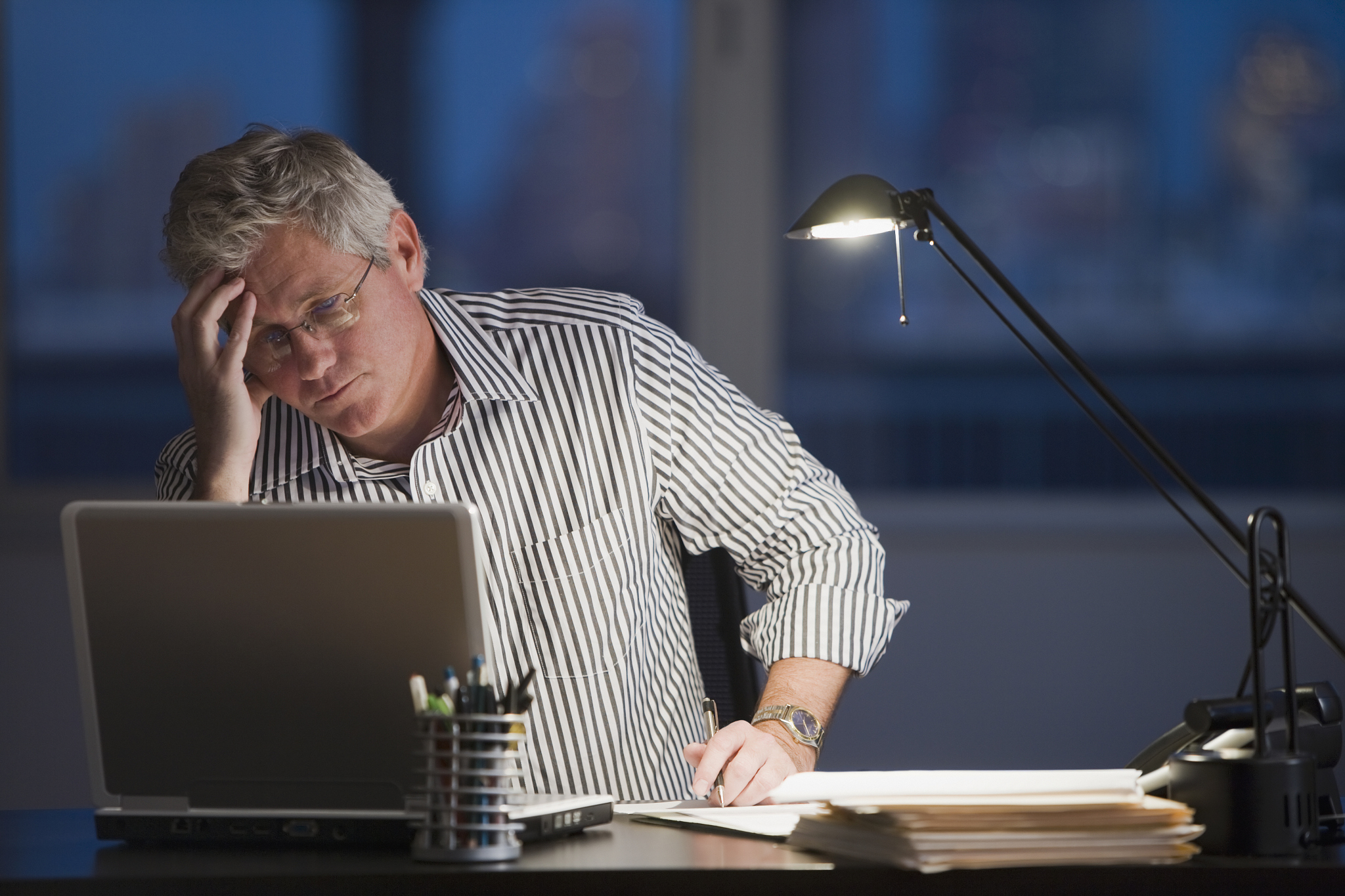 businessman looking at laptop