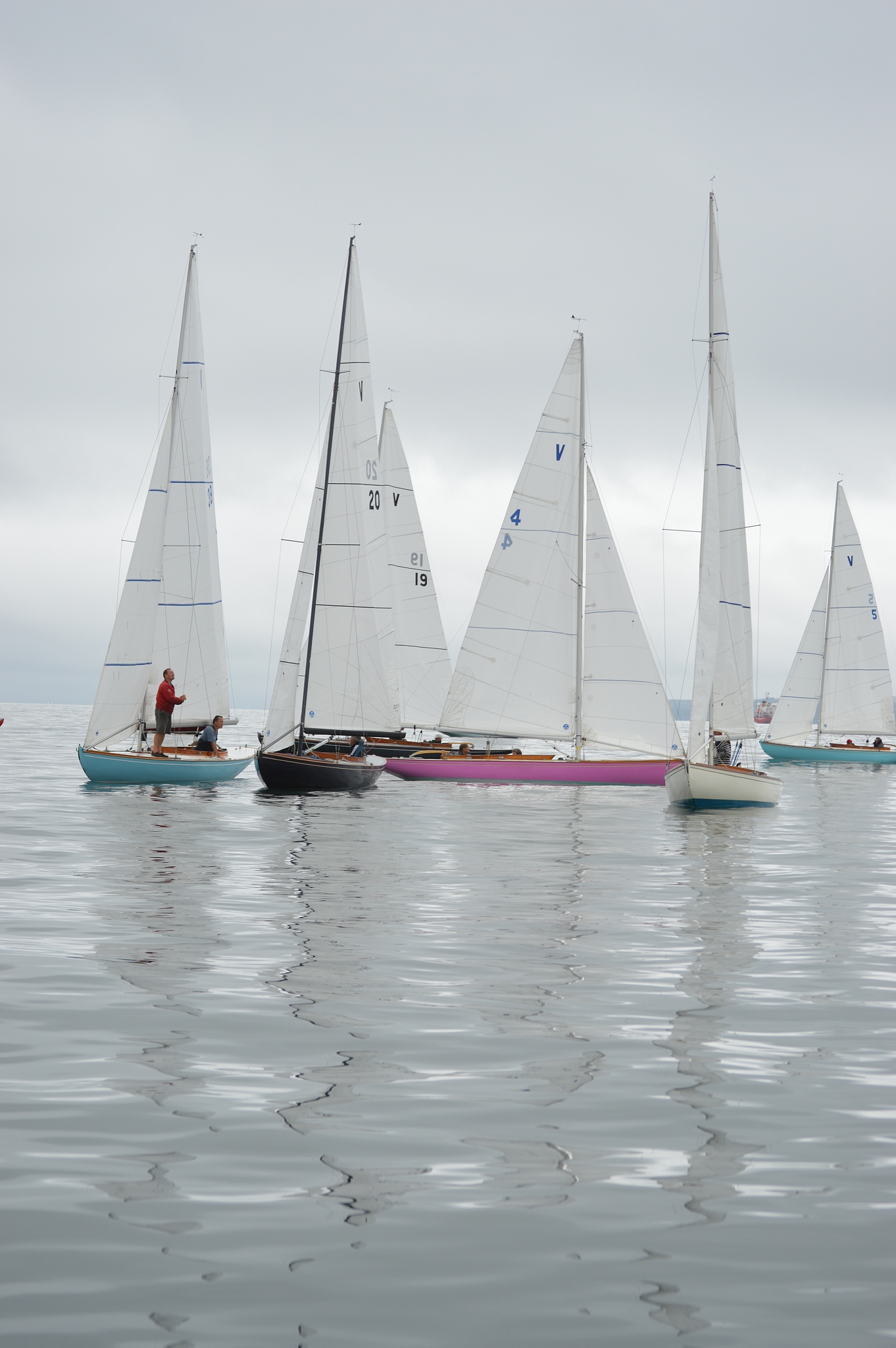 sailboats sailing in sea against sky