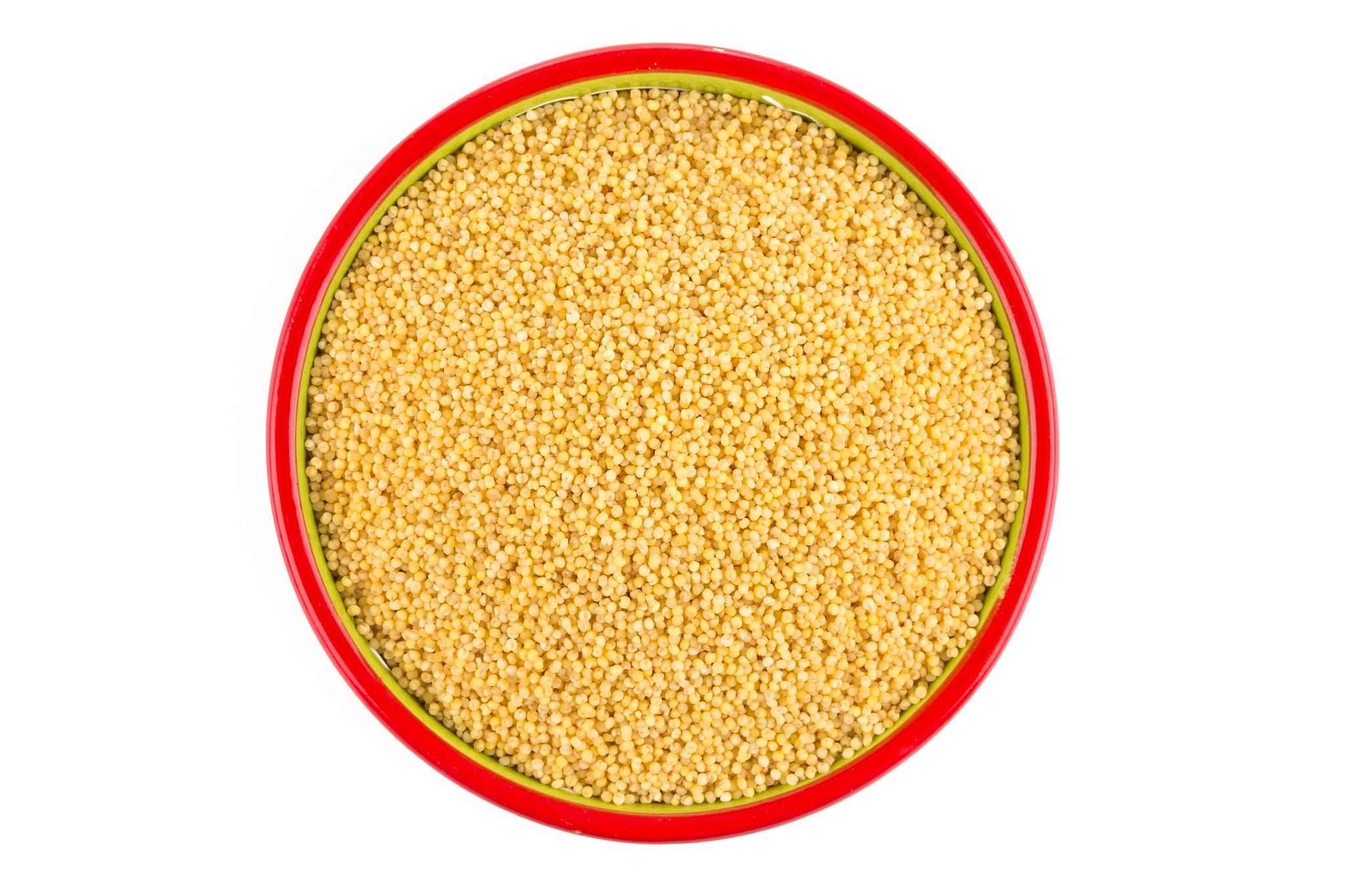 dry millet isolated on white. top view or flat lay. healthy food
