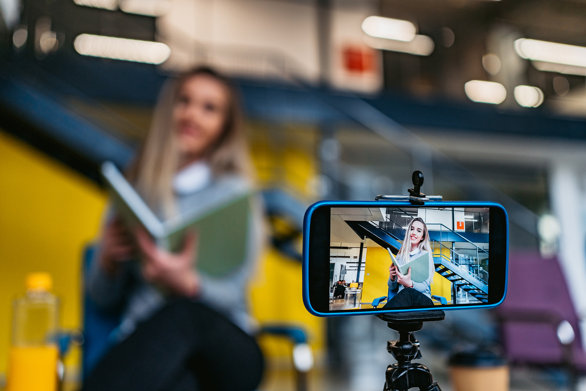 young woman holding online education course