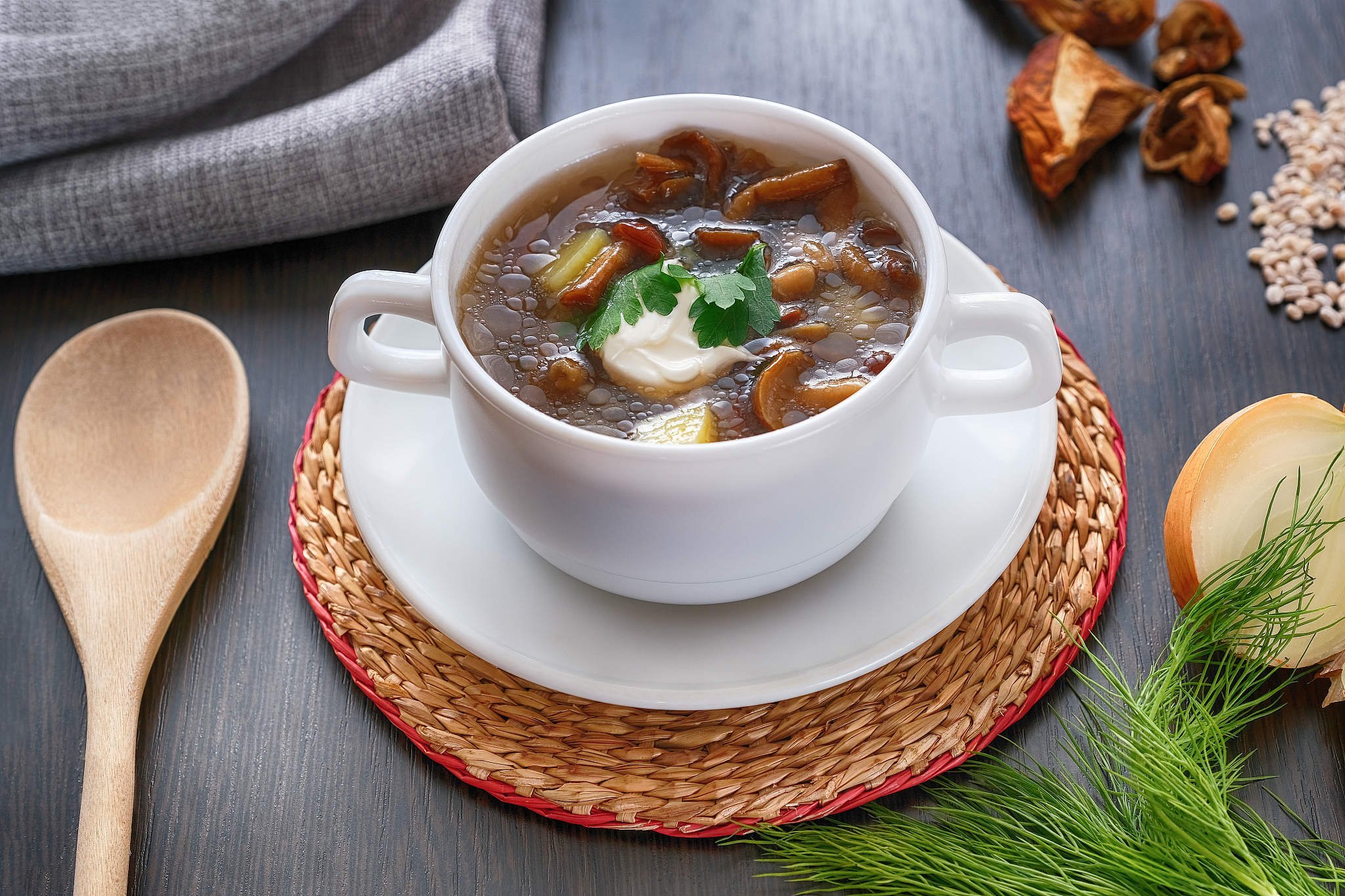 delicious mushroom soup with parsley close-up on the table. hori