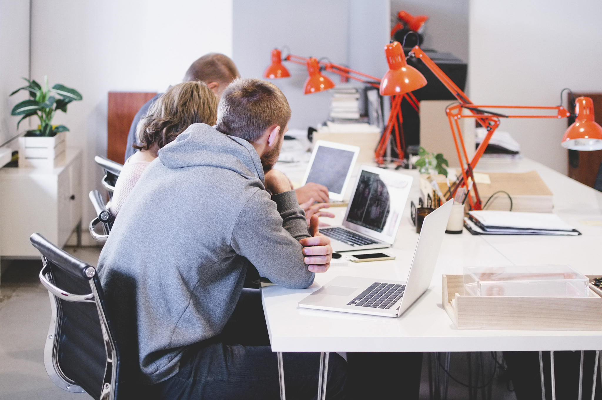 business people working at desk in creative office