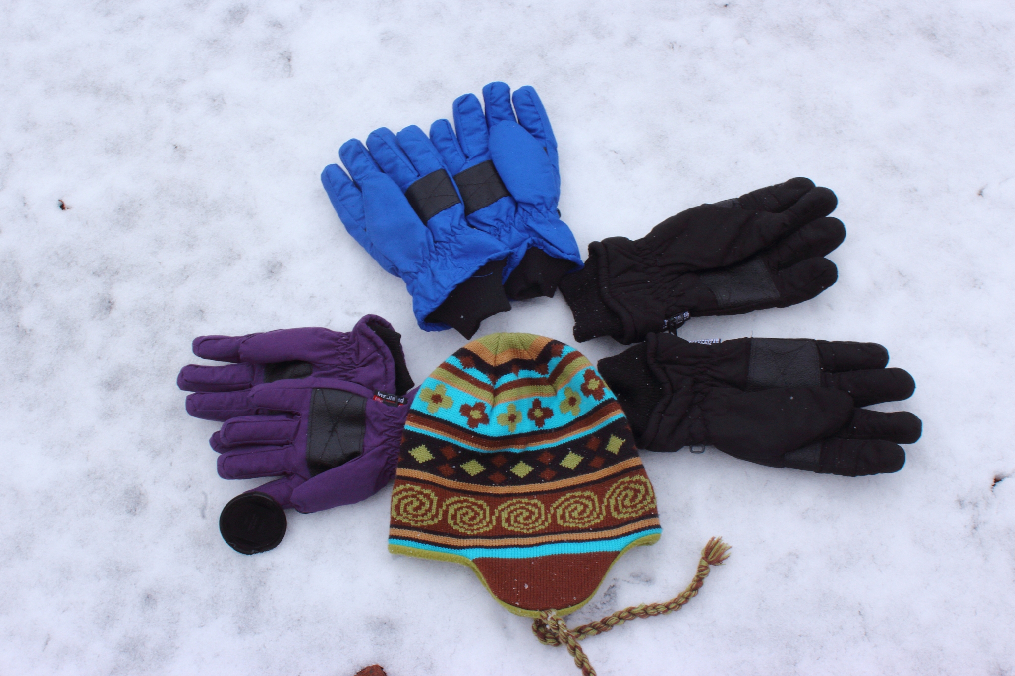 glove family on a snowy day