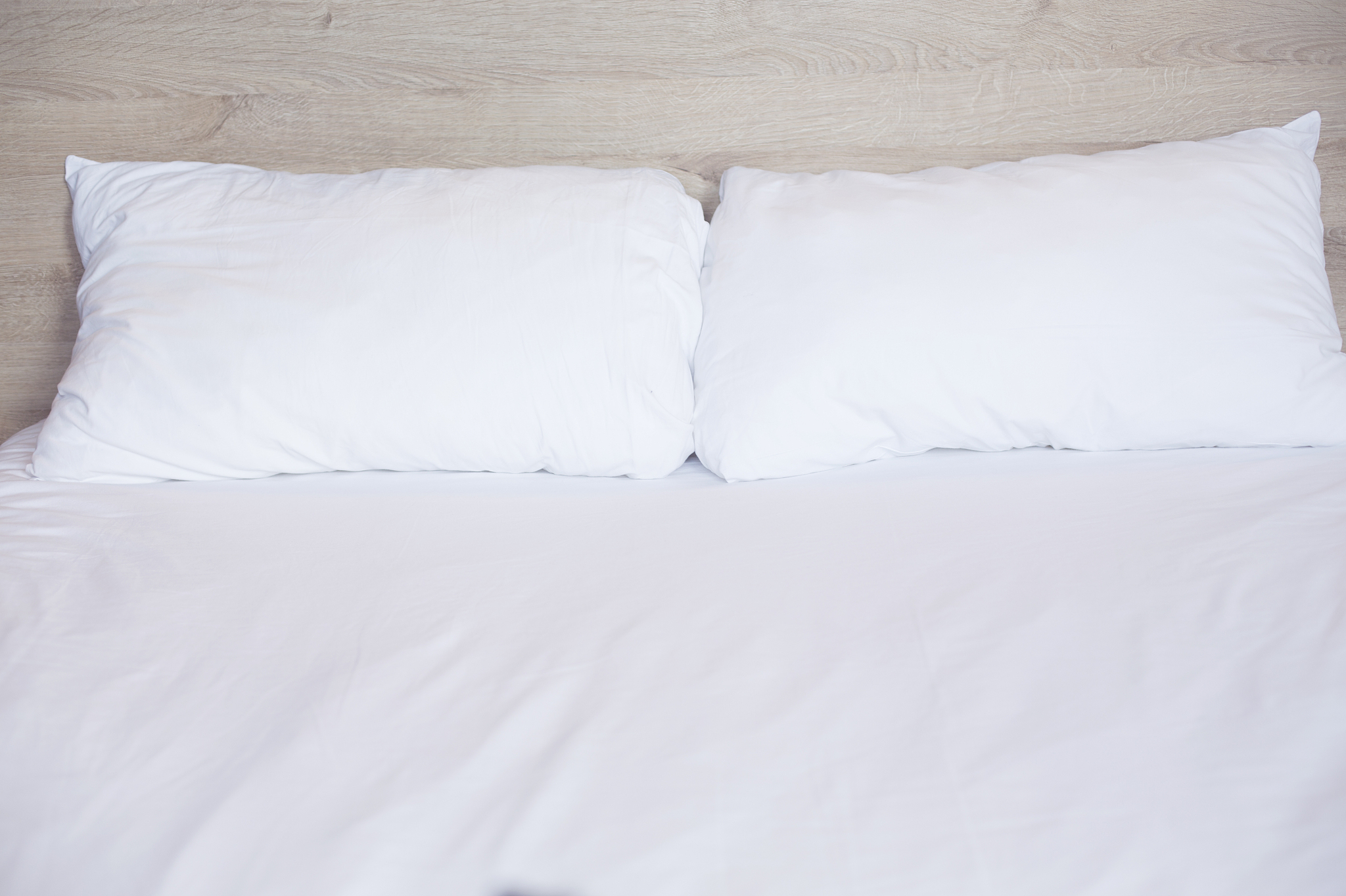 bed with white sheets