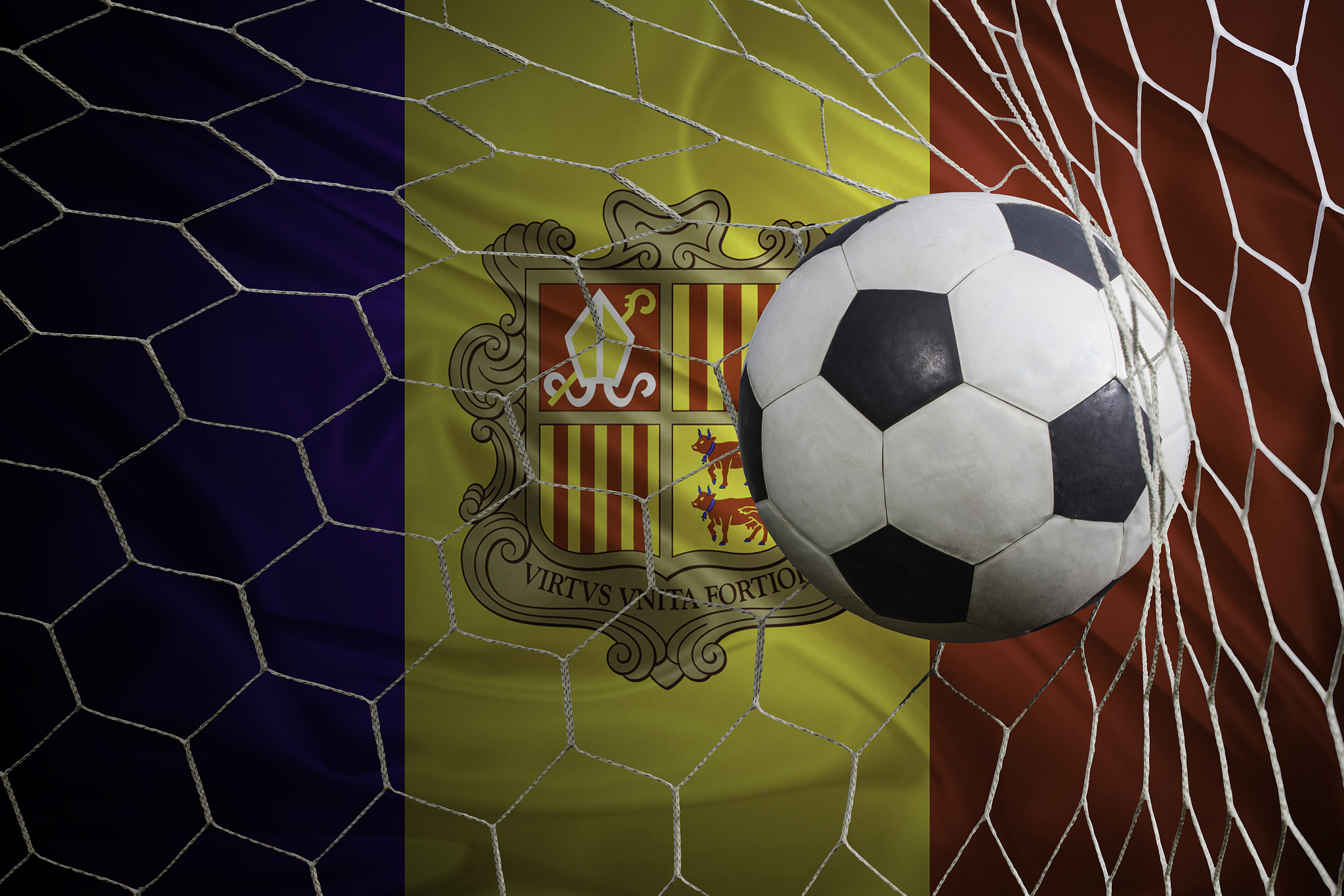 andorra flag and soccer ball, football in goal net