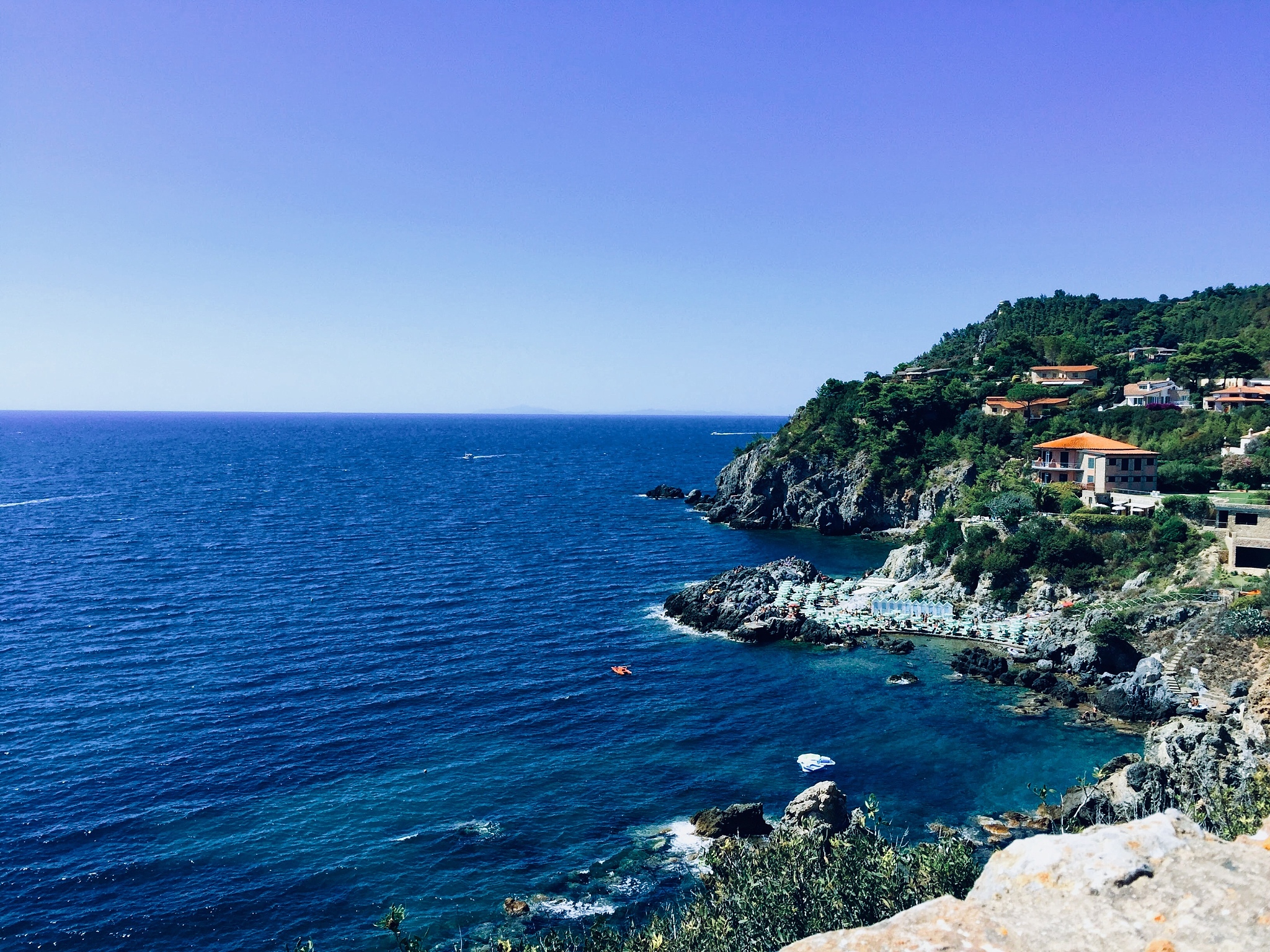 scenic view of sea against clear blue sky