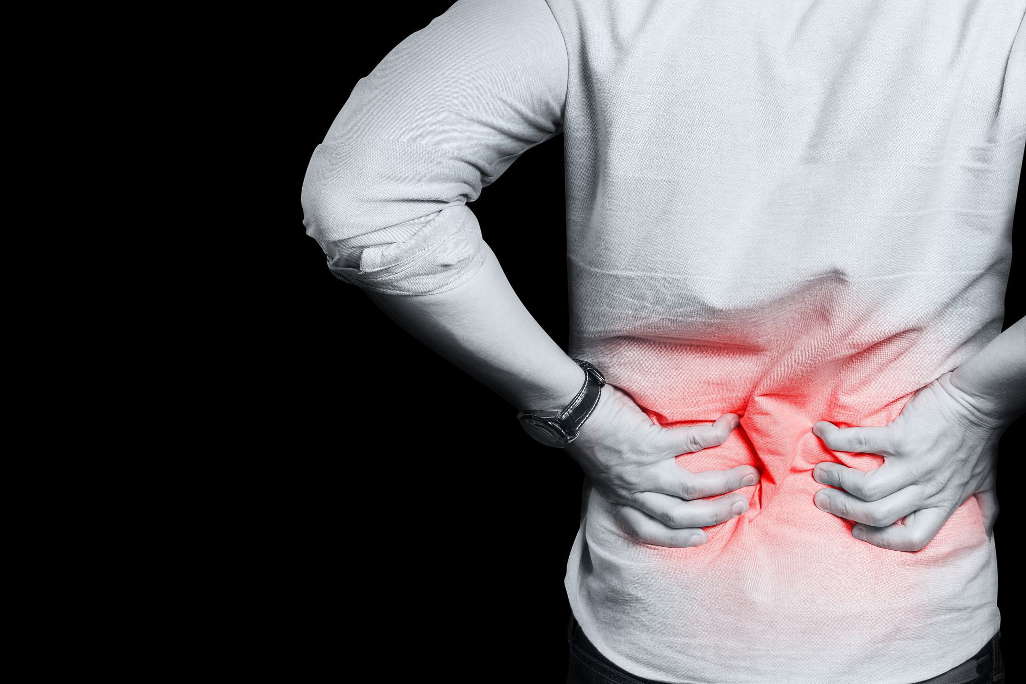 lower back pain on black background
