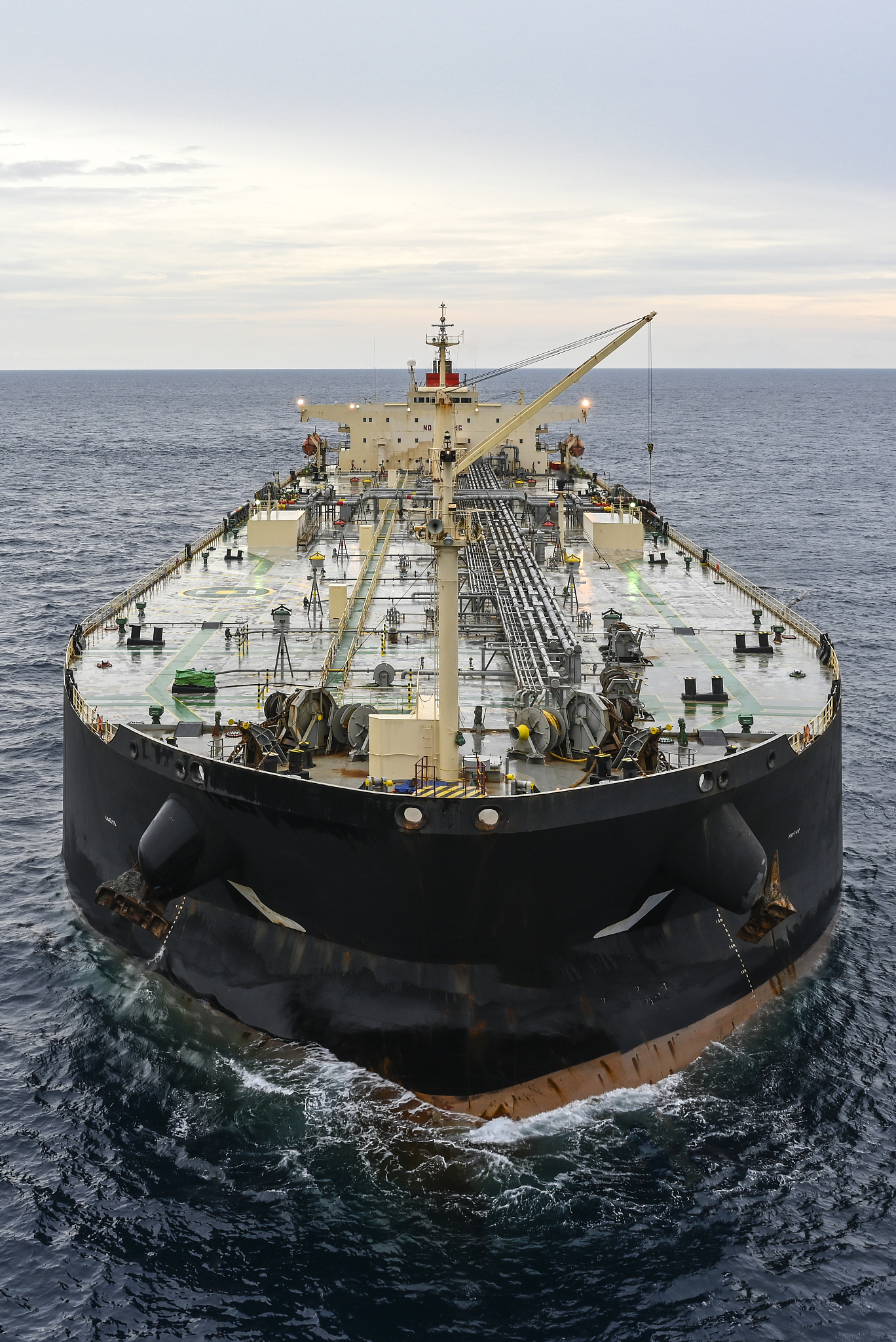 the oil tanker in the high sea after a rain
