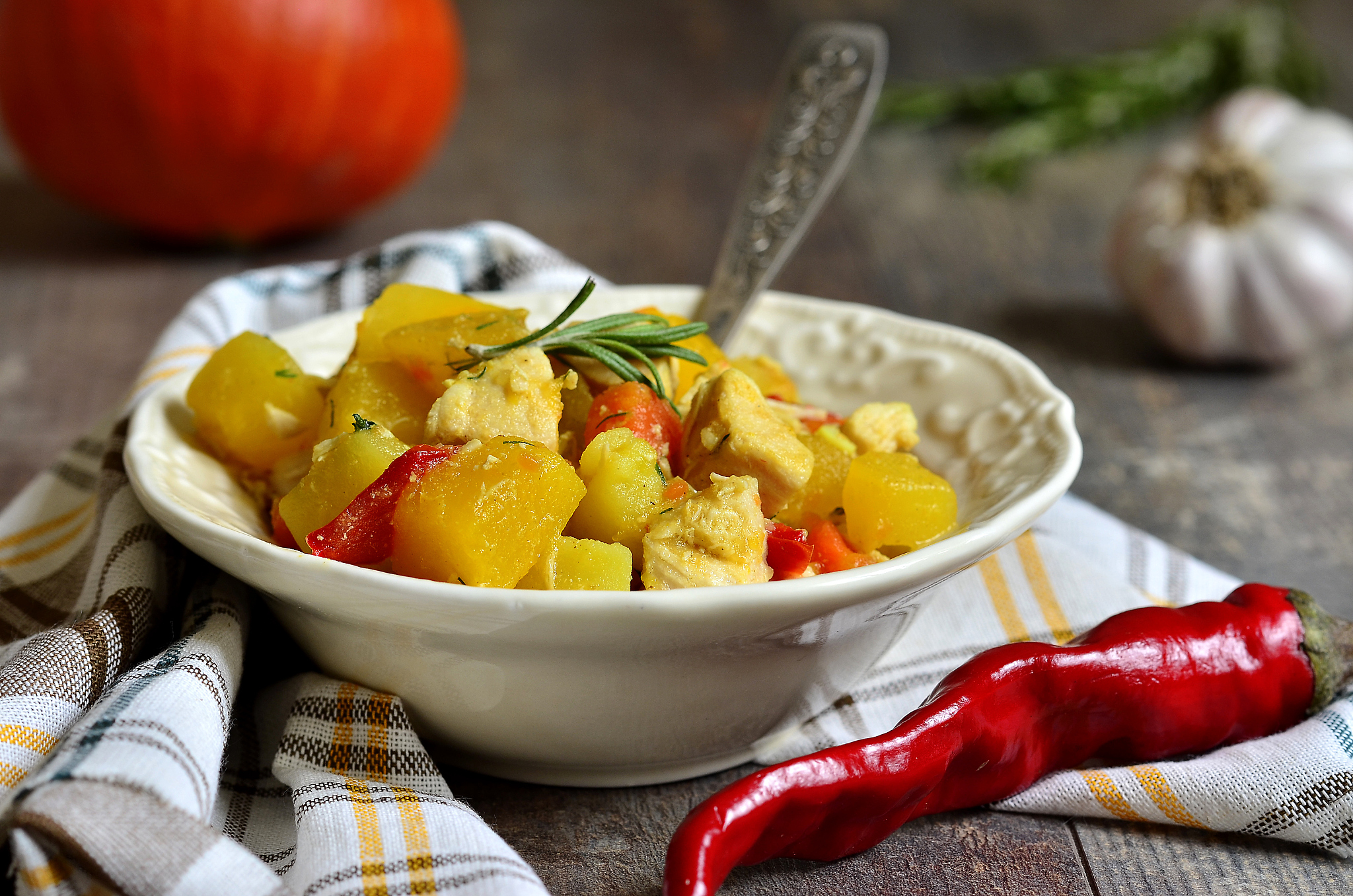 pumpkin stewed with chicken and rosemary.