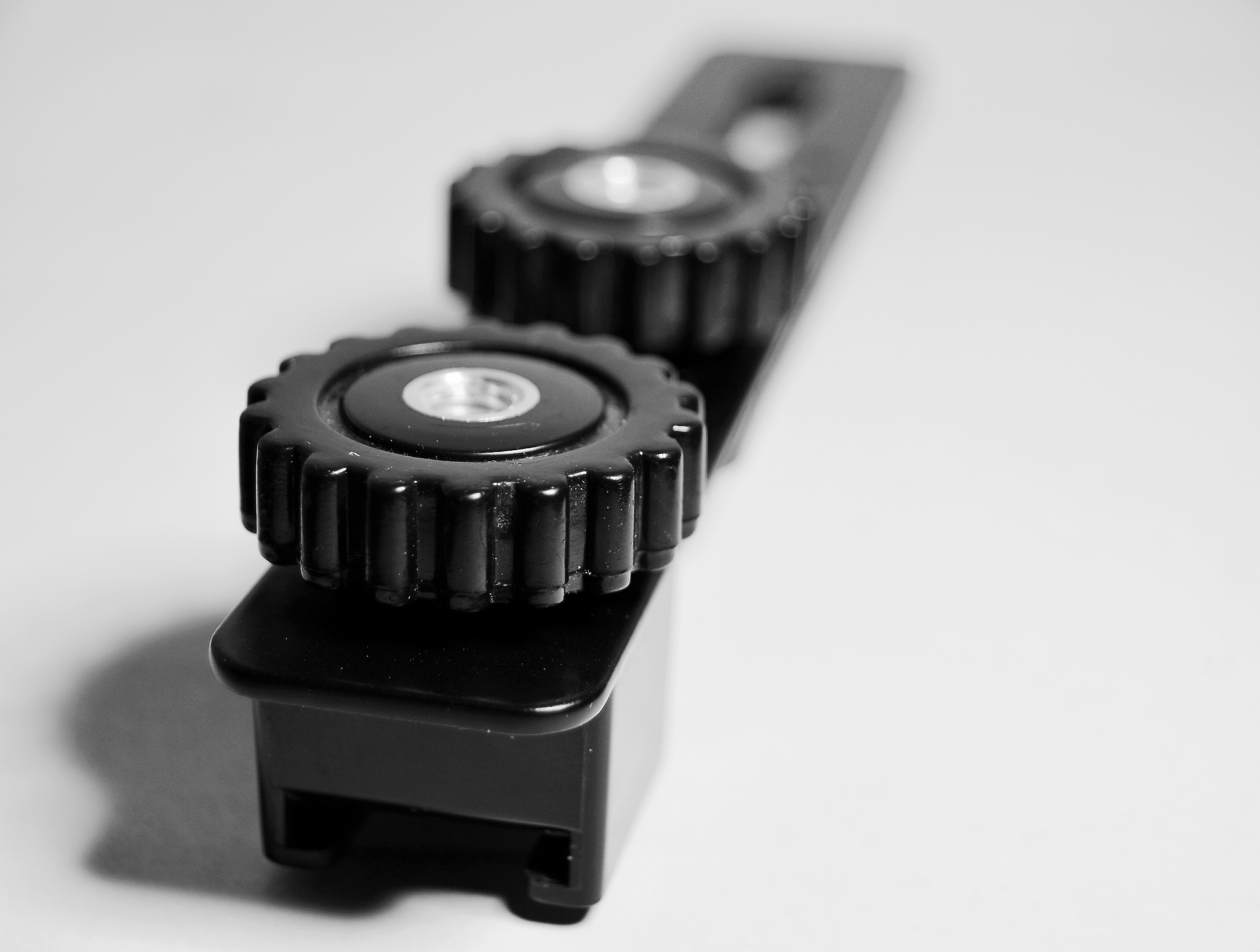 close-up of equipment on table against white background