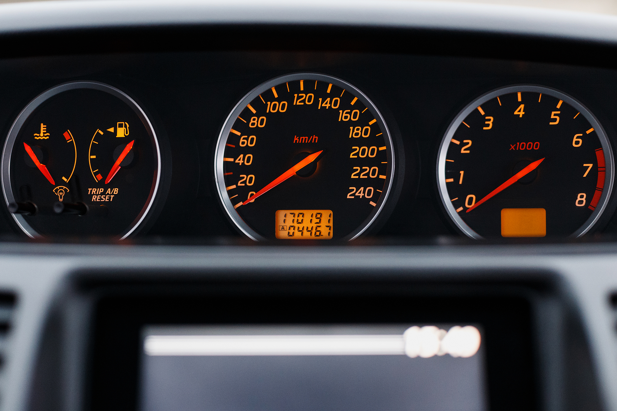 dashboard close up, car interior, red light
