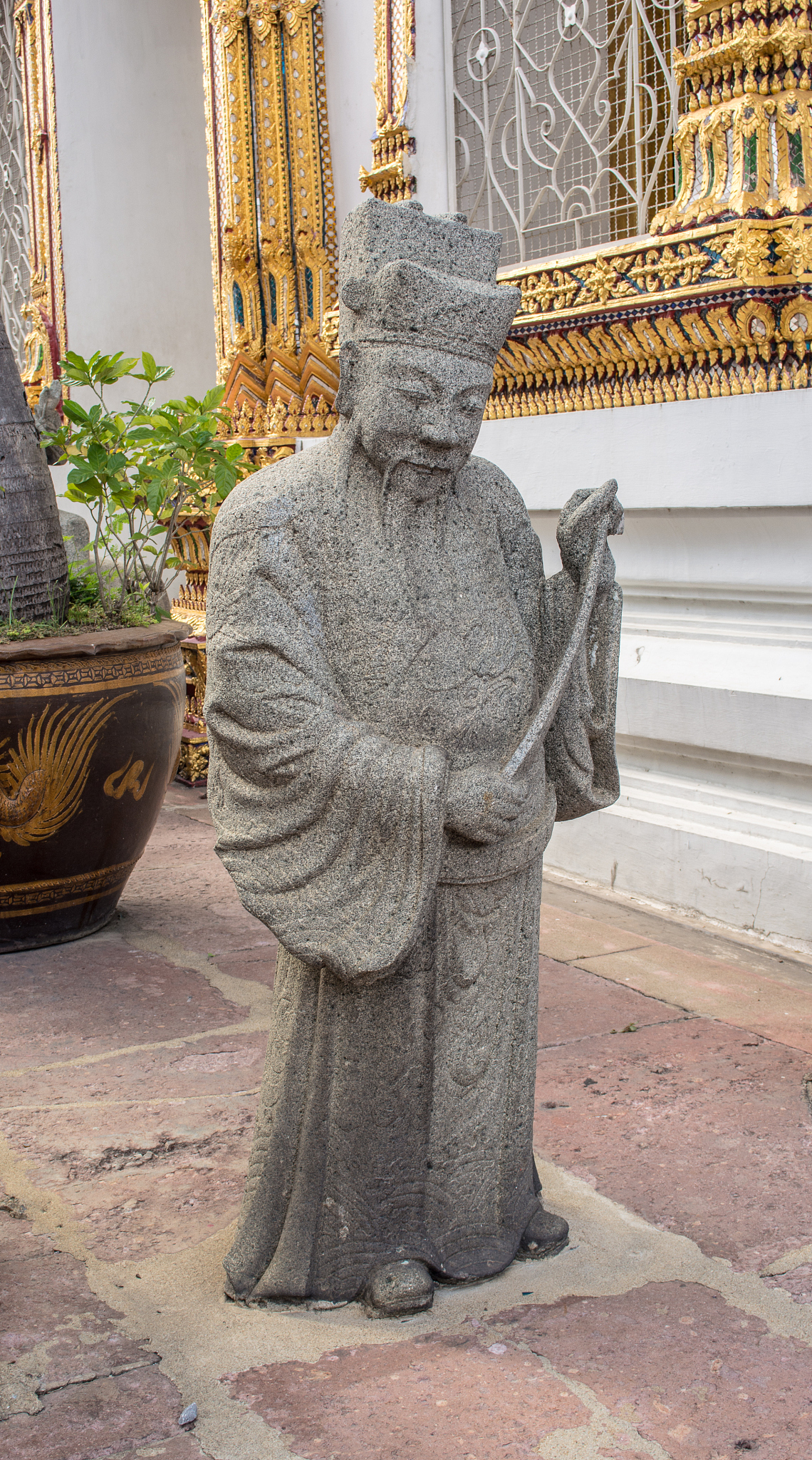 sandstone doll at wat pho in bangkok thailand
