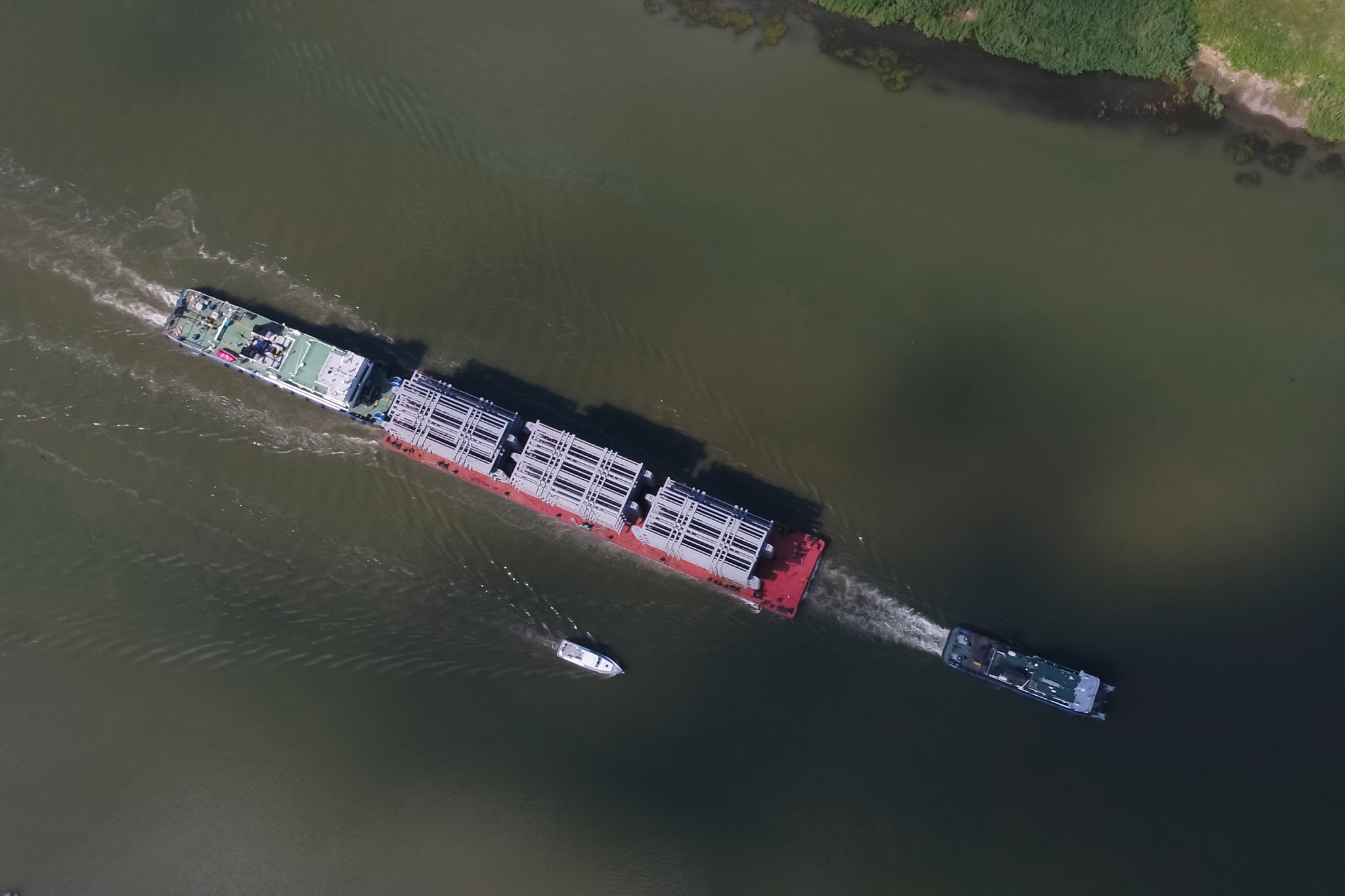 oversized cargo transportation along the river, a distillation c