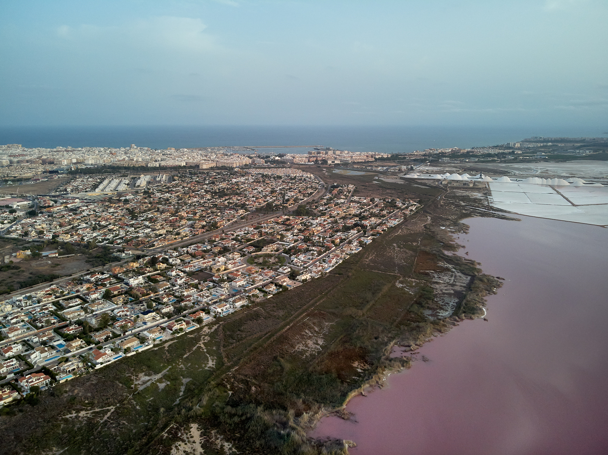 panoramic aerial view of torrevieja cityscape and las salinas, p