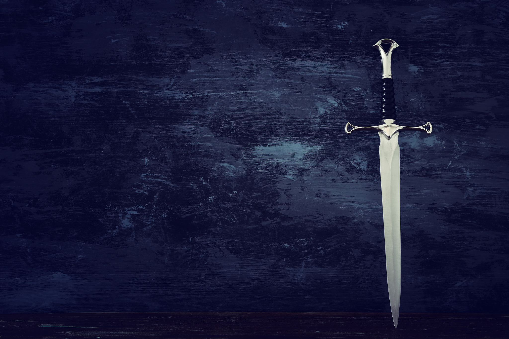 low key banner of silver sword and old wooden chest. fantasy med