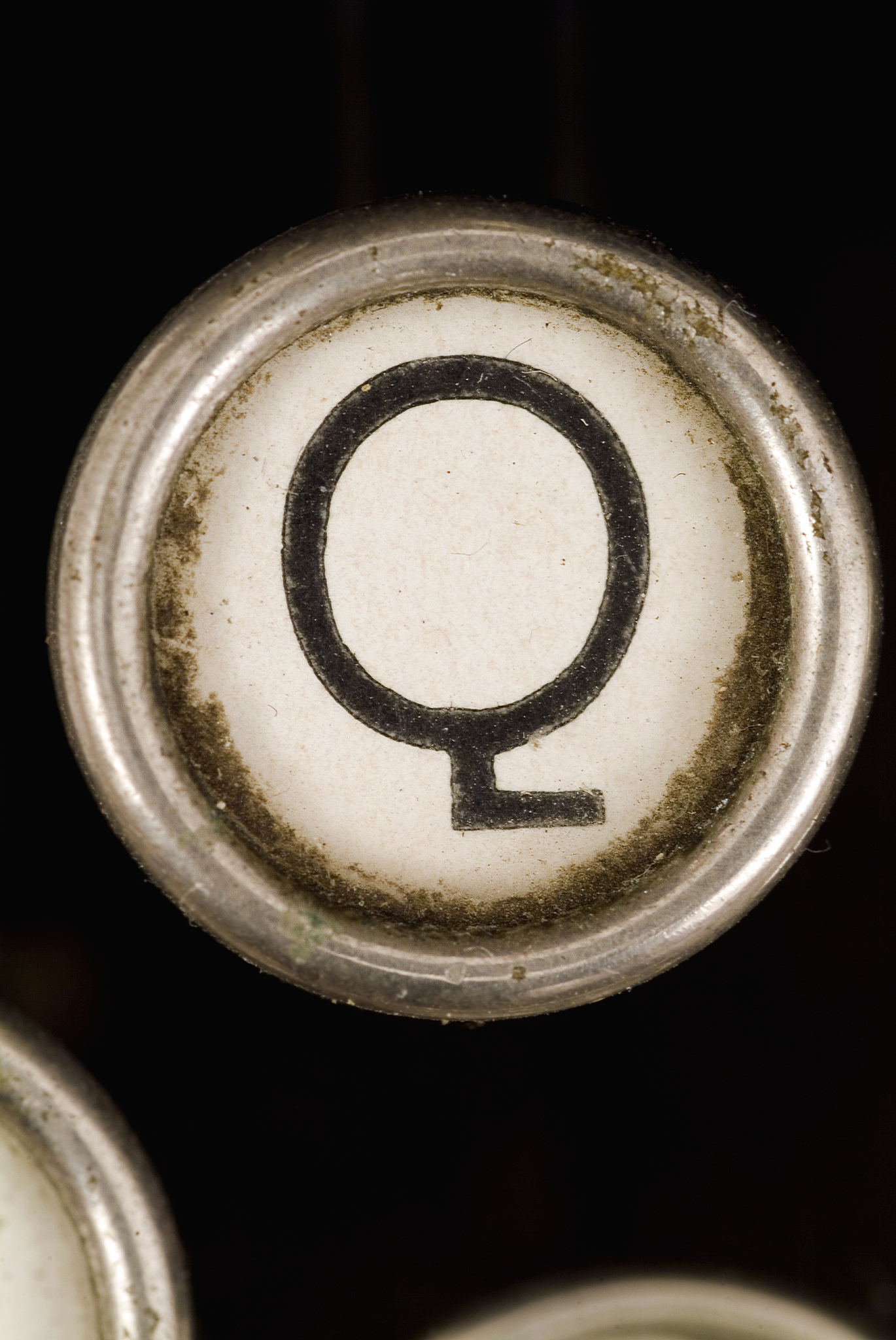 q key of a full alphabet from grungey typewriter