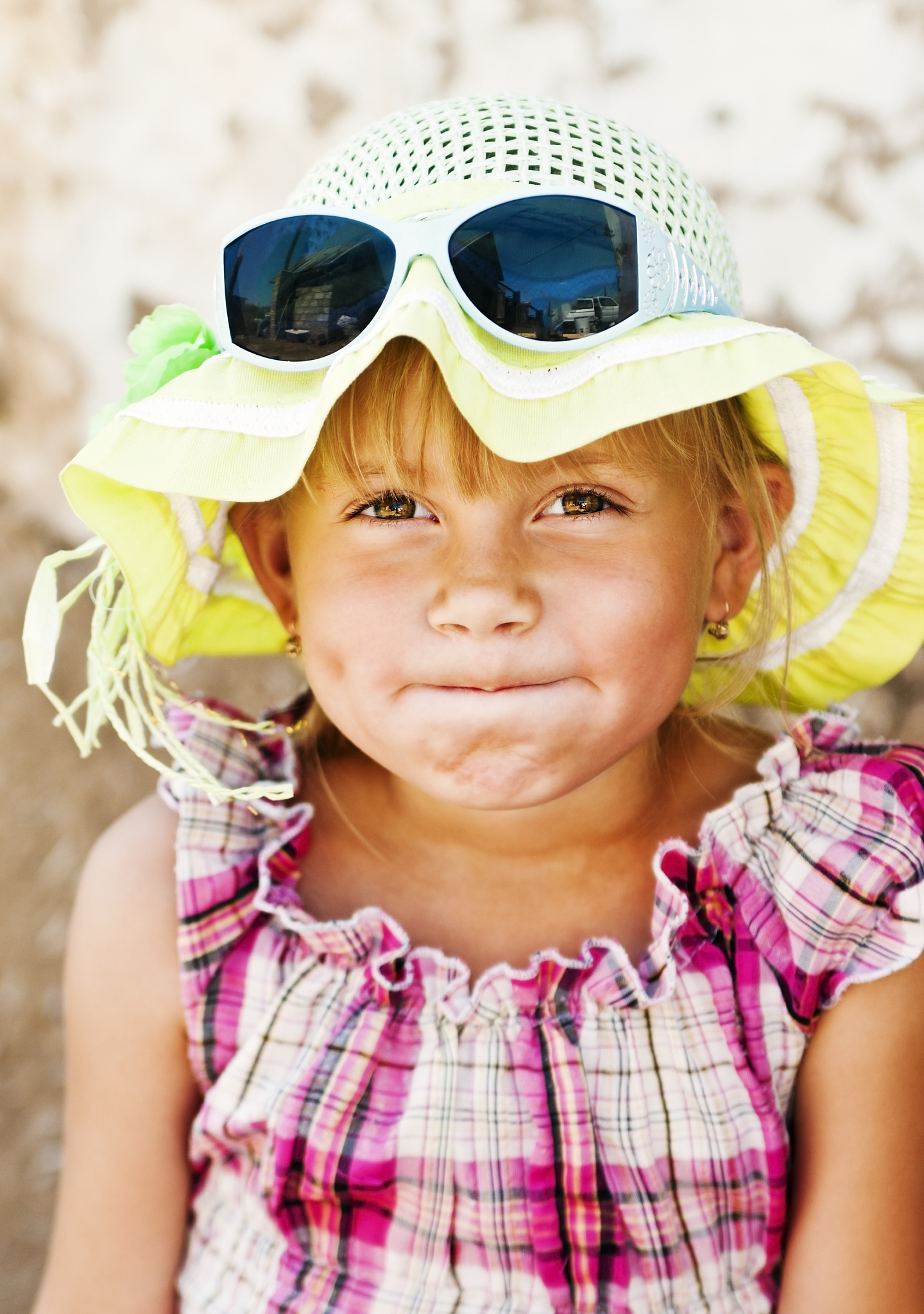 portrait of a smiling country girl with pursed lips
